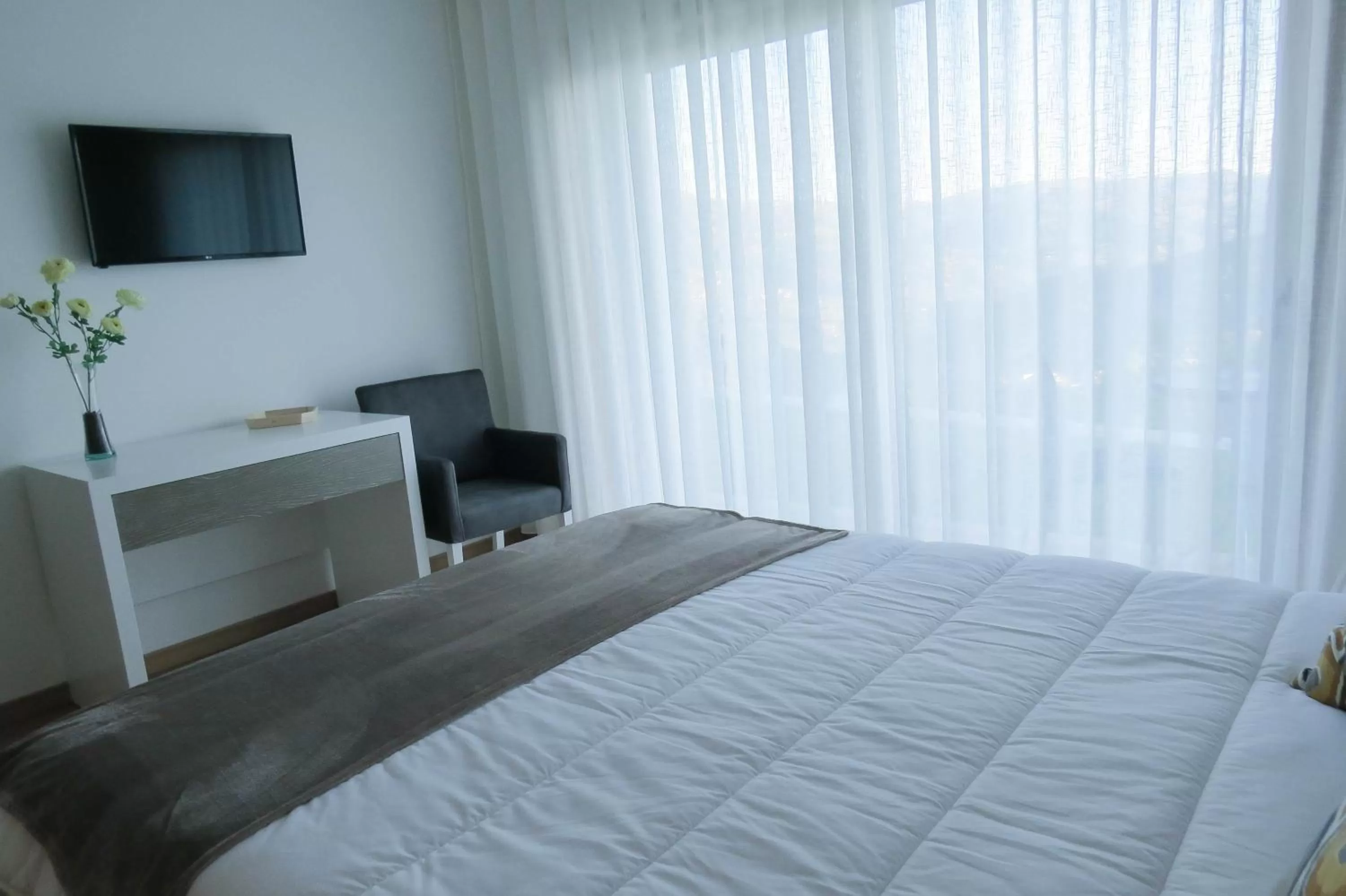 Photo of the whole room, Bed in Casa Miradouro