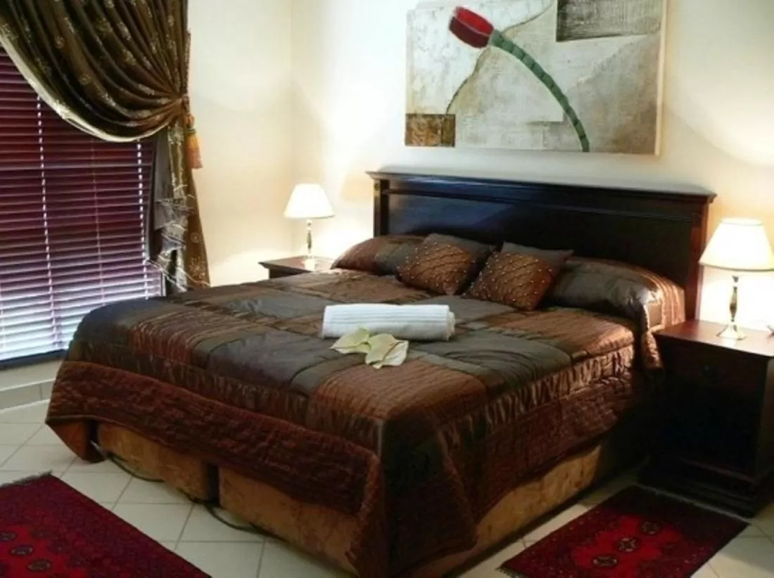 Photo of the whole room, Bed in Rustenburg Boutique Hotel