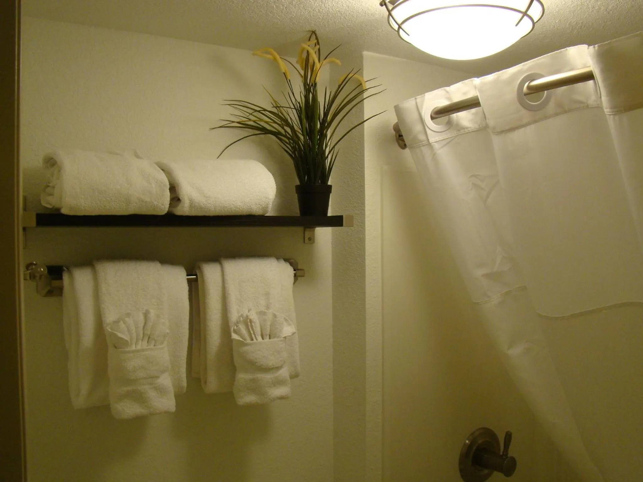 Bathroom in Infinity Inn & Suites