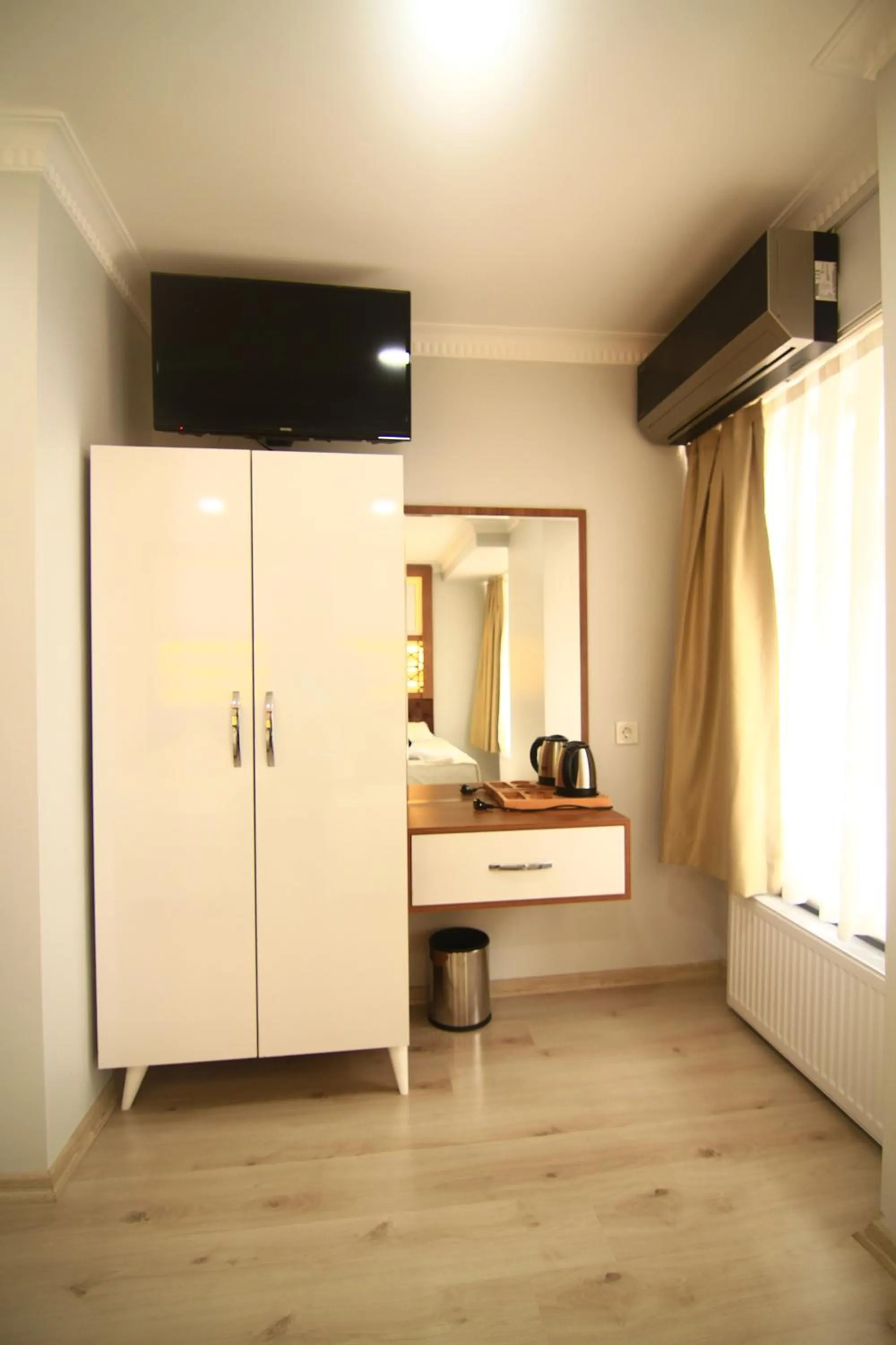 Bed in Grand Liza Hotel