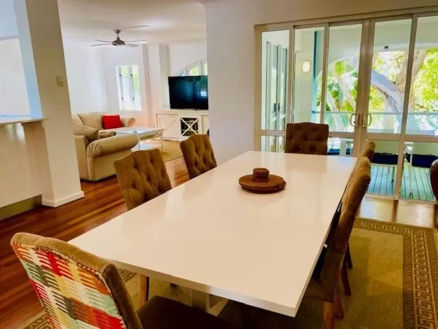 Communal lounge/ TV room in BeachView Apartments at Villa Paradiso