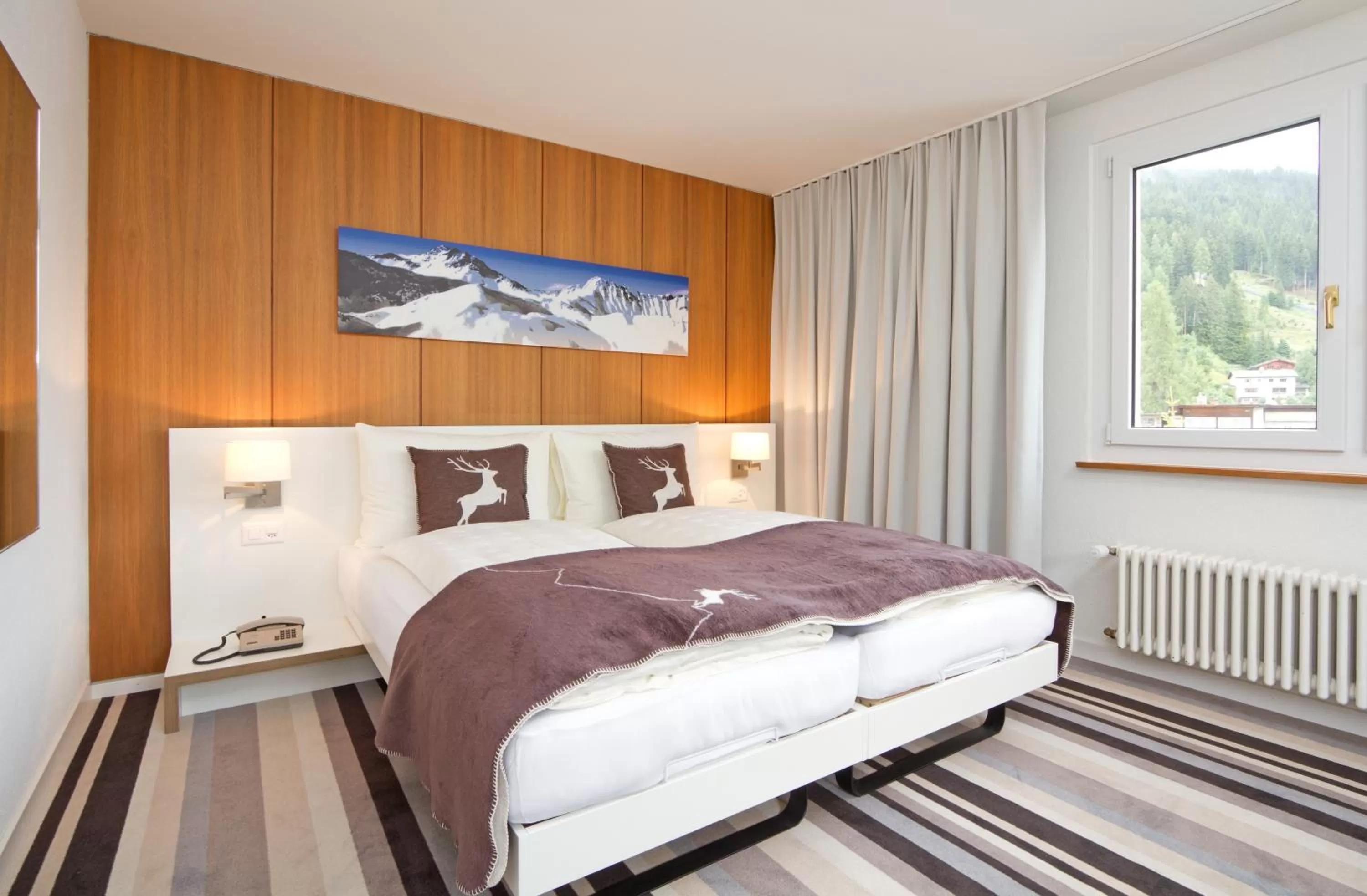 Bed in Hotel National by Mountain Hotels