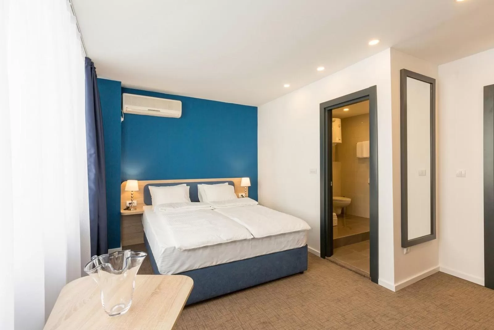 Photo of the whole room, Bed in Premium Crown Suites