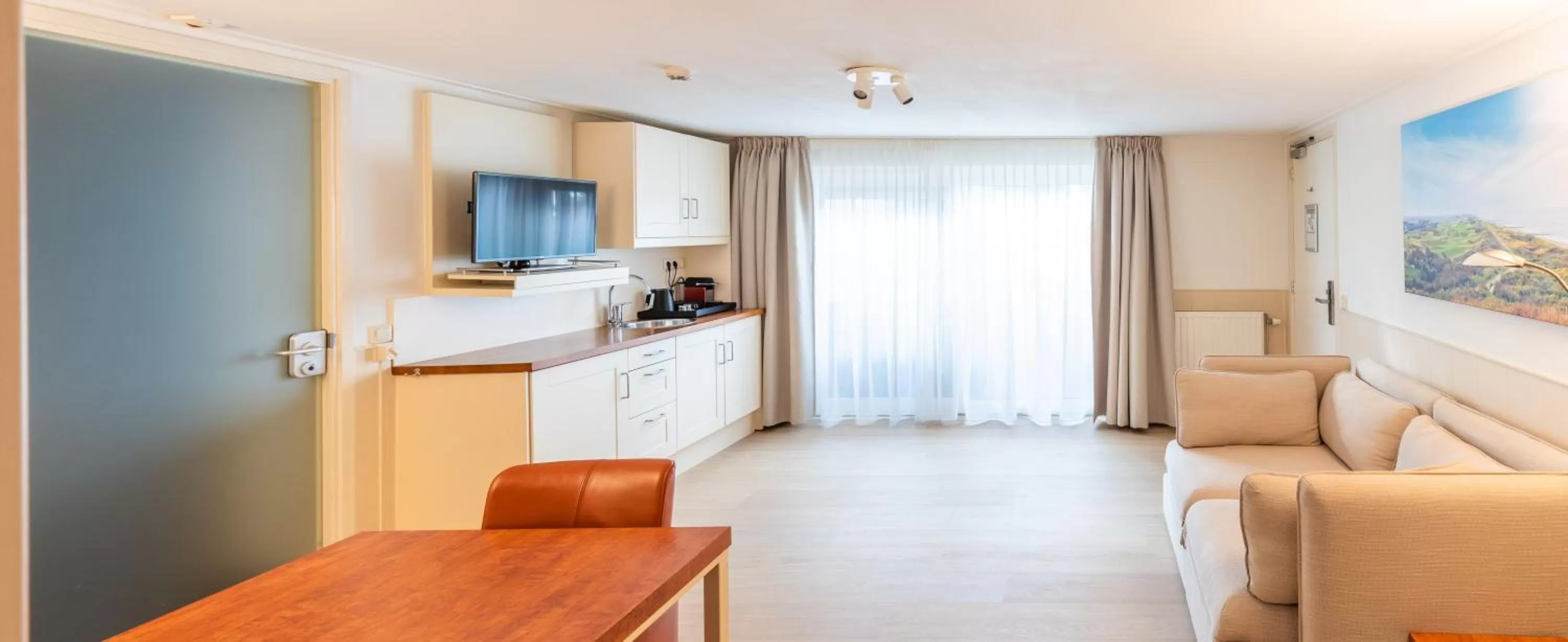 Living room, Kitchen/Kitchenette in Hotel ter Duyn