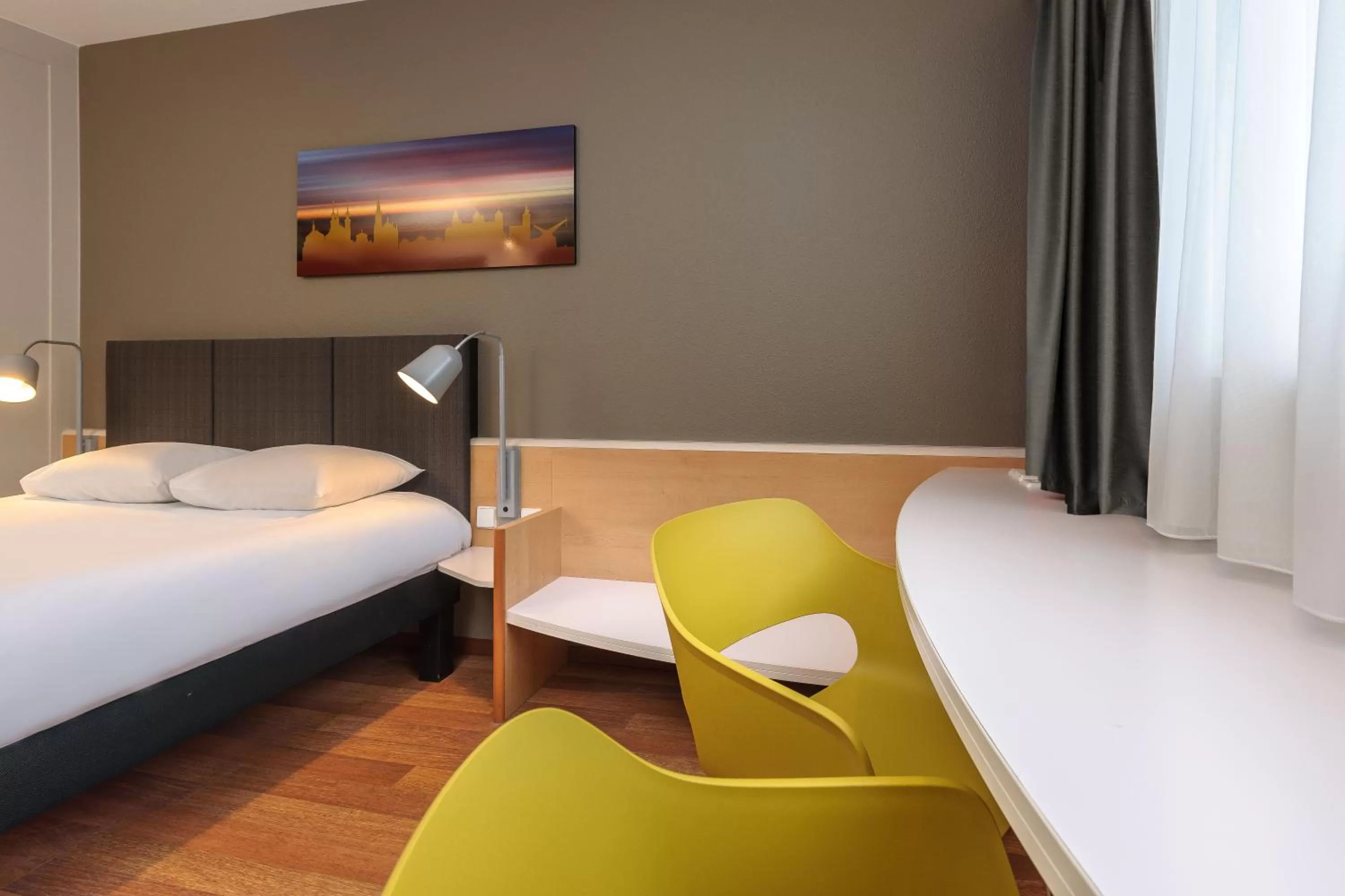 Photo of the whole room, Bed in ibis Hotel Würzburg City