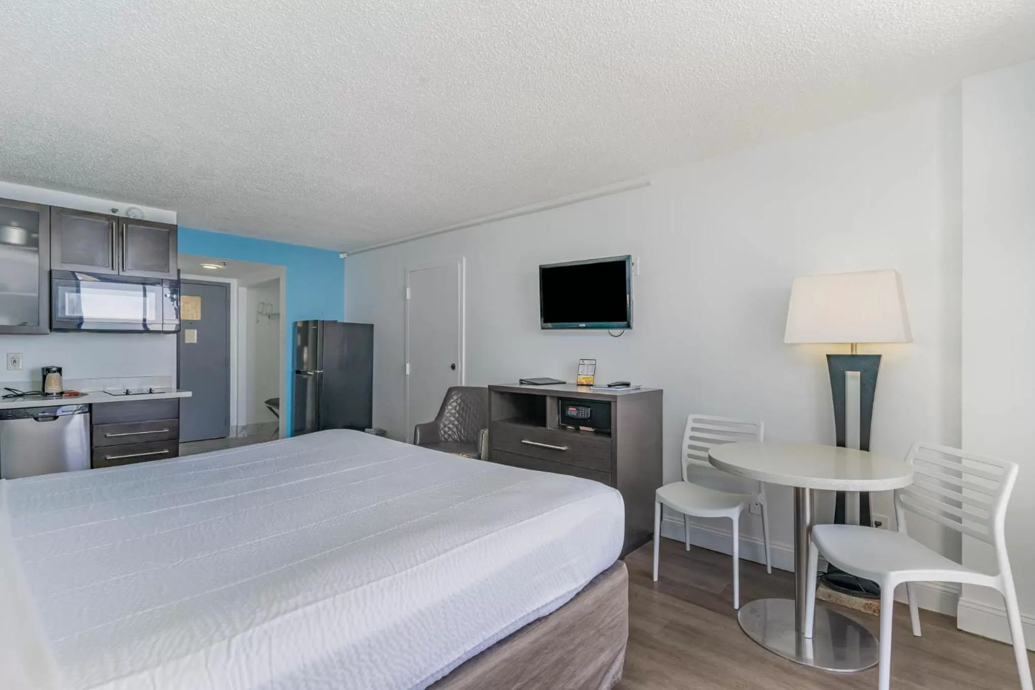 Kitchen or kitchenette in Sun N Sand Resort