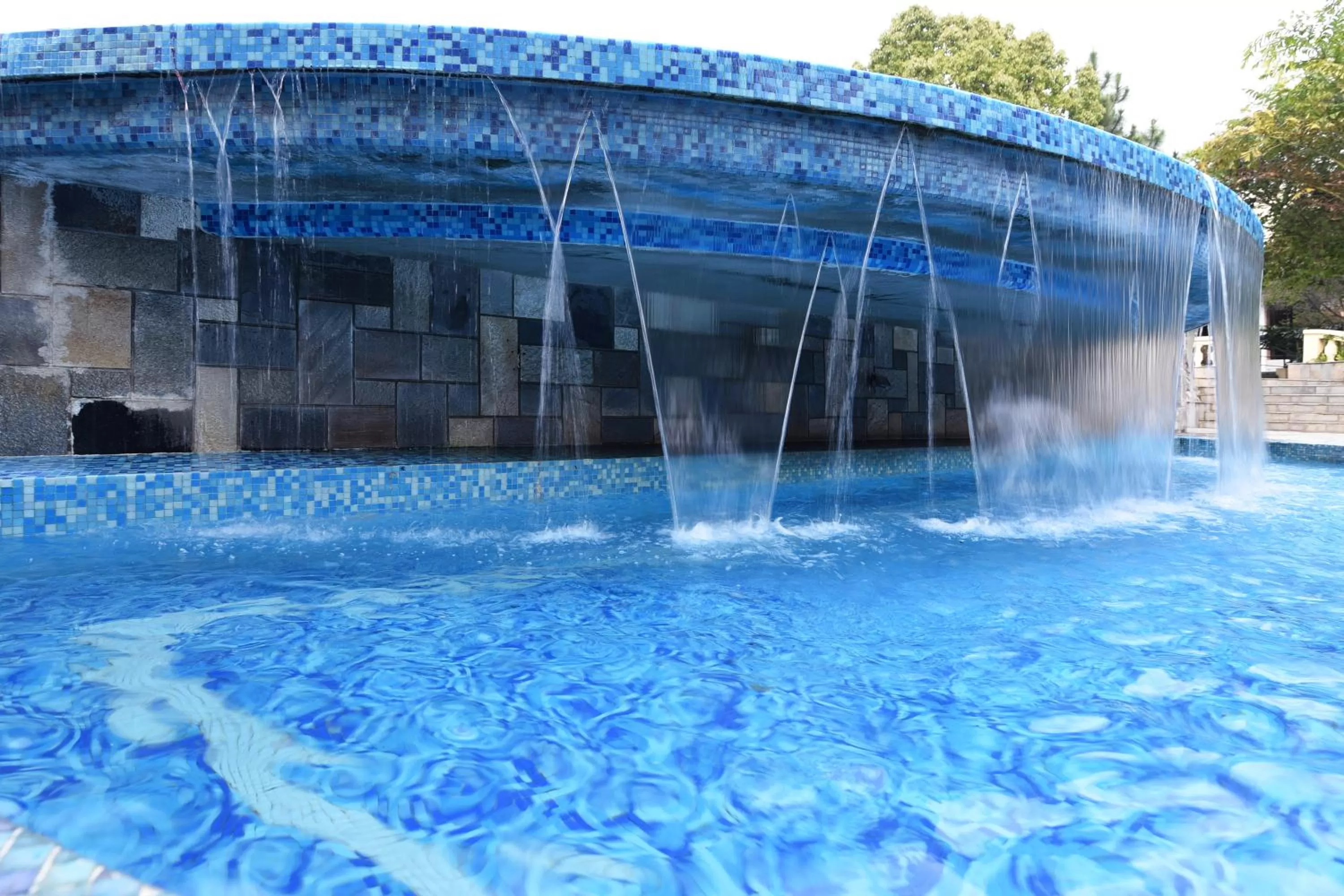 Swimming pool in Park Village Resort by KGH Group