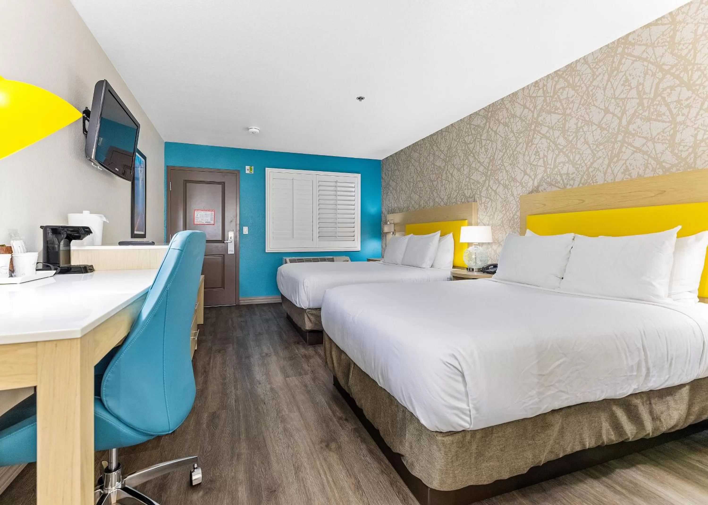 Bed in Hillstone Inn Tulare, an Ascend Collection Hotel