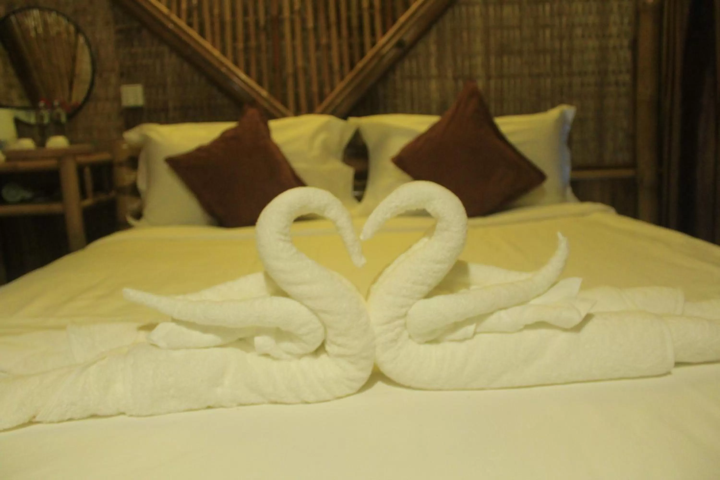 Bed in Hanchey Bamboo Resort