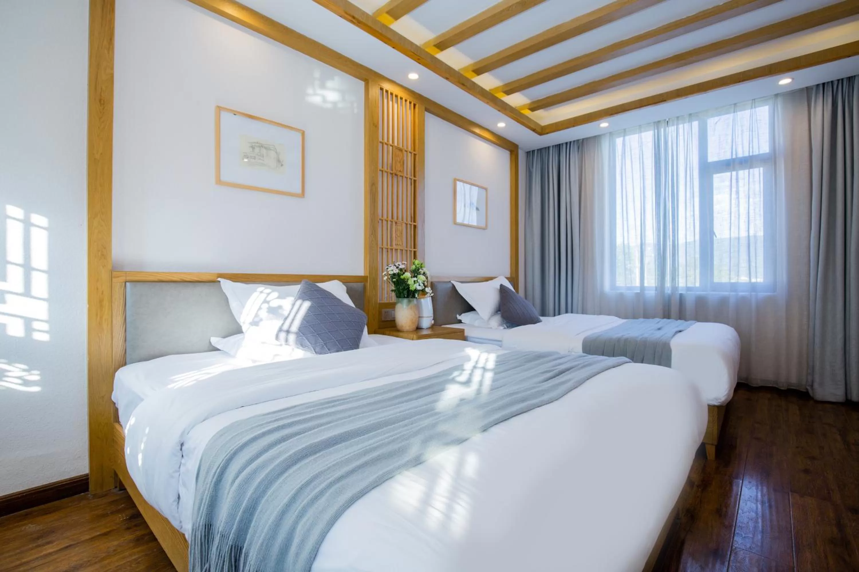 Bed in Lijiang Gemmer Hotel