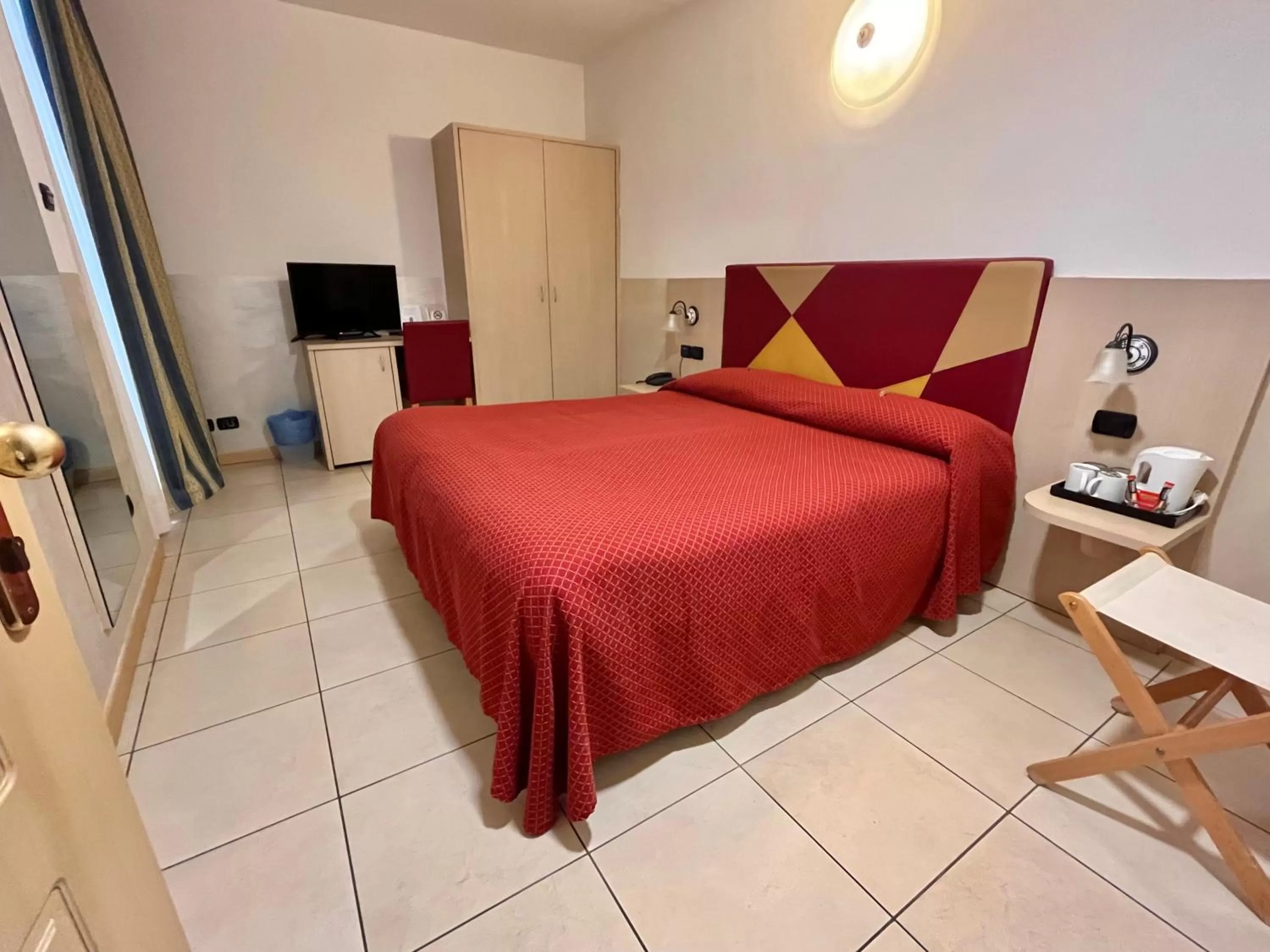 Bed in Hotel Lovere Resort & Spa