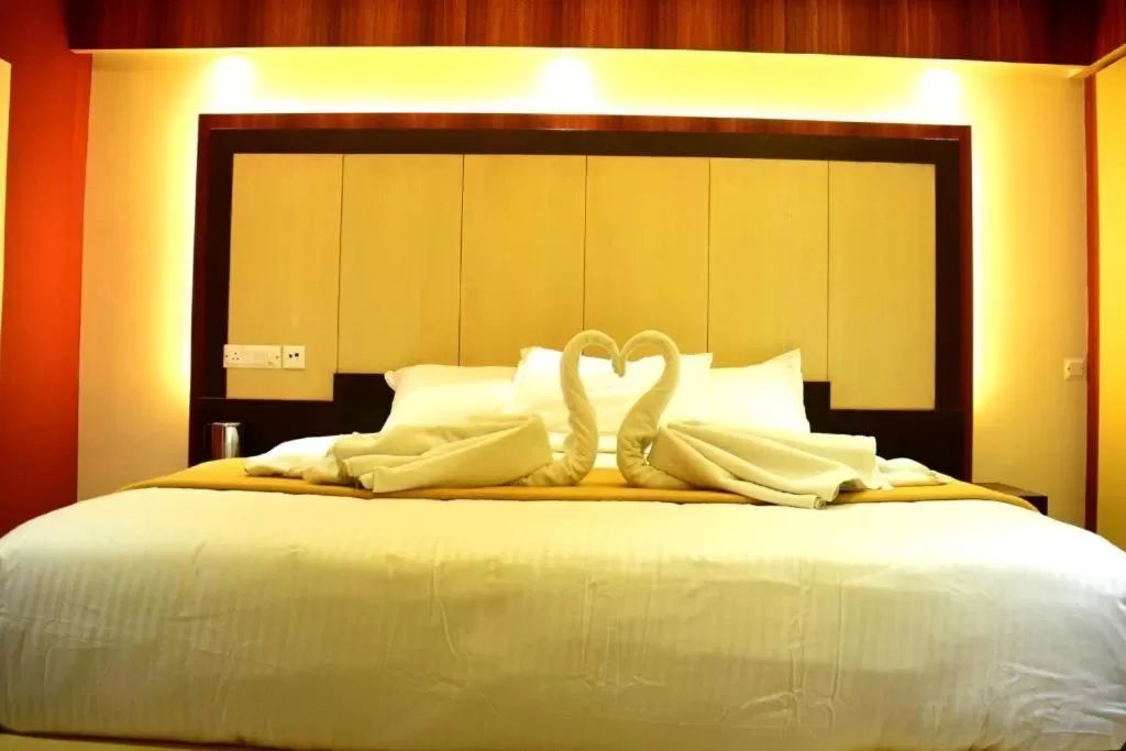 Bed in Star MSR Residency