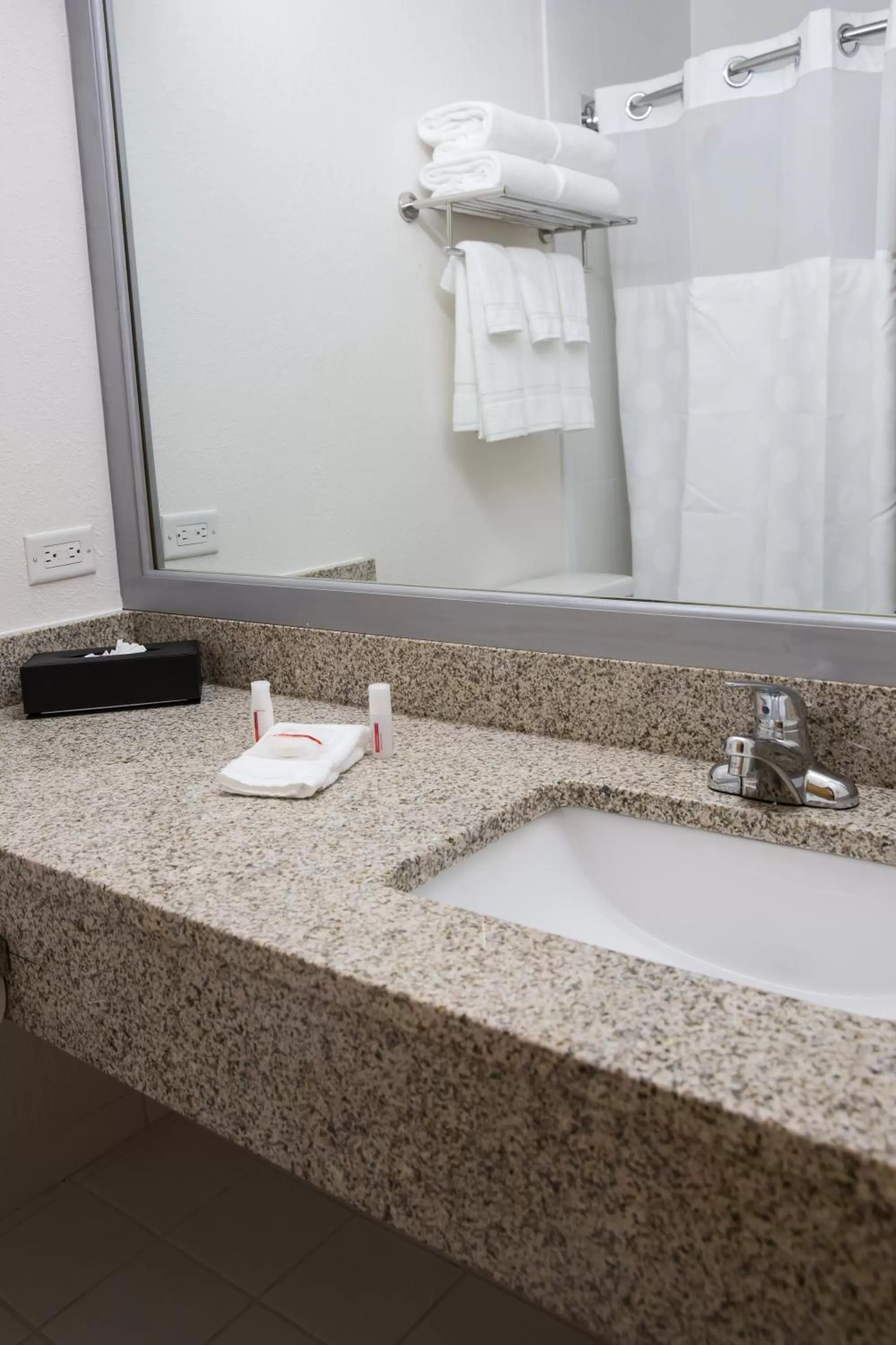 Toilet in Ramada Plaza by Wyndham Chicago North Shore