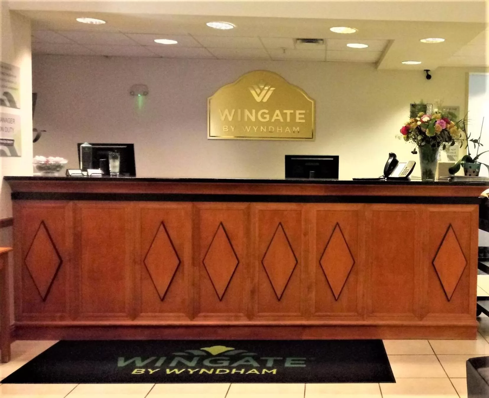 Property logo or sign in Wingate by Wyndham Bentonville