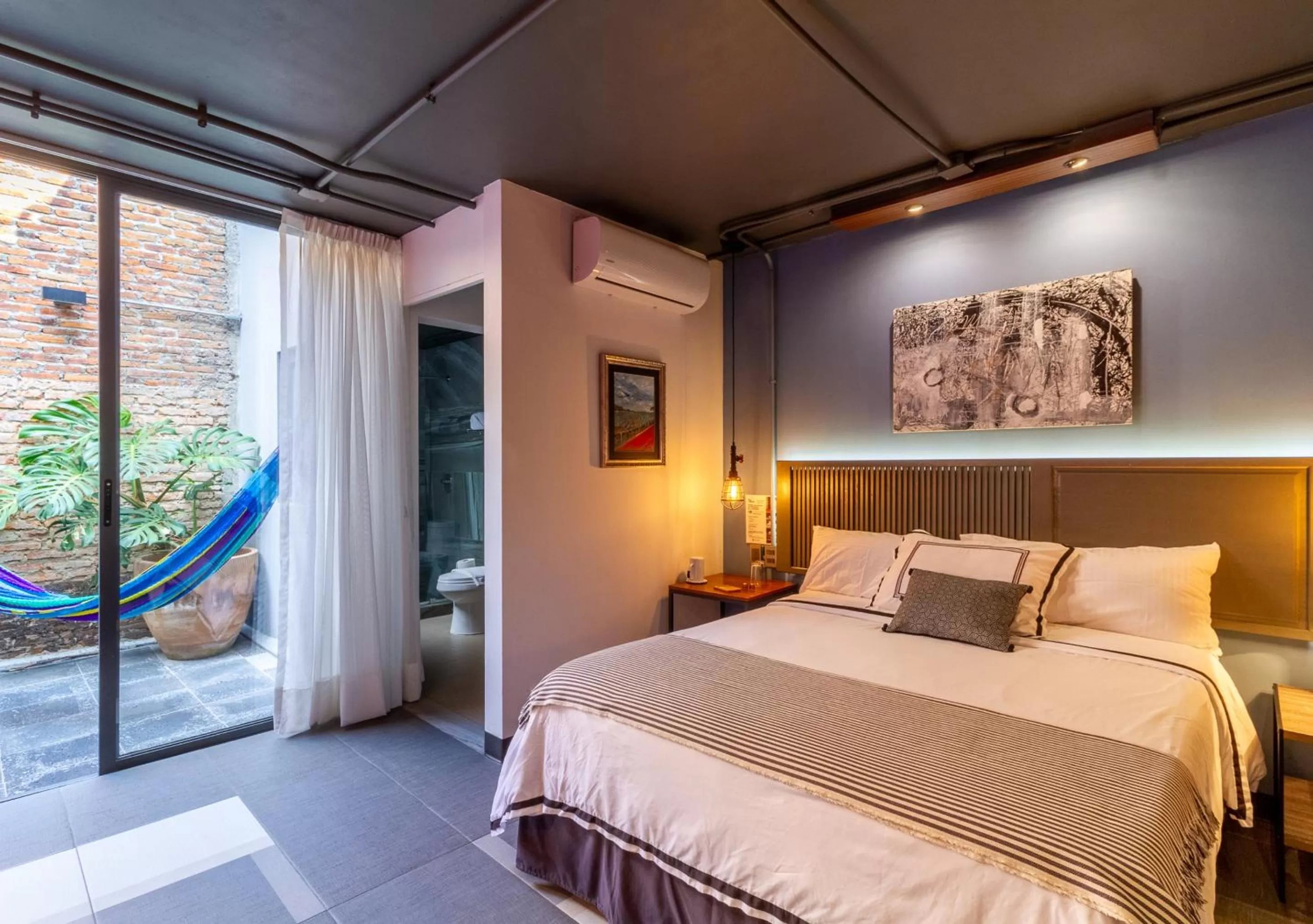 Bedroom, Bed in The Yellow by DOT Boutique