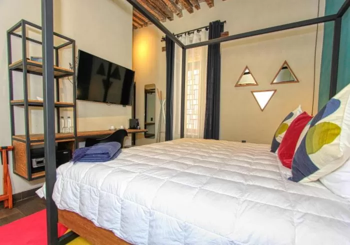 Bed in Antigua Trece Hotel Fusión & SPA