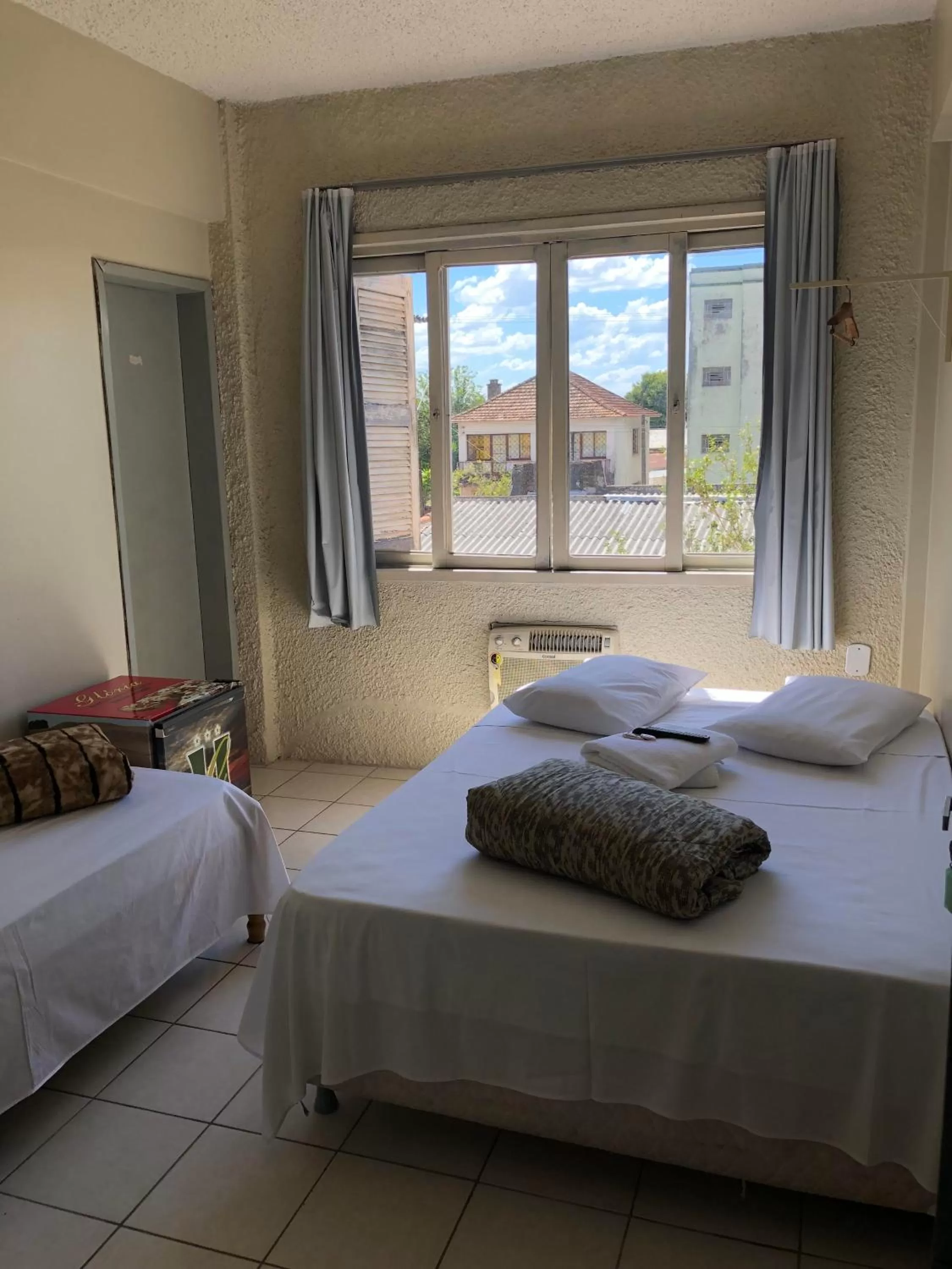 Bed in Hotel Glória