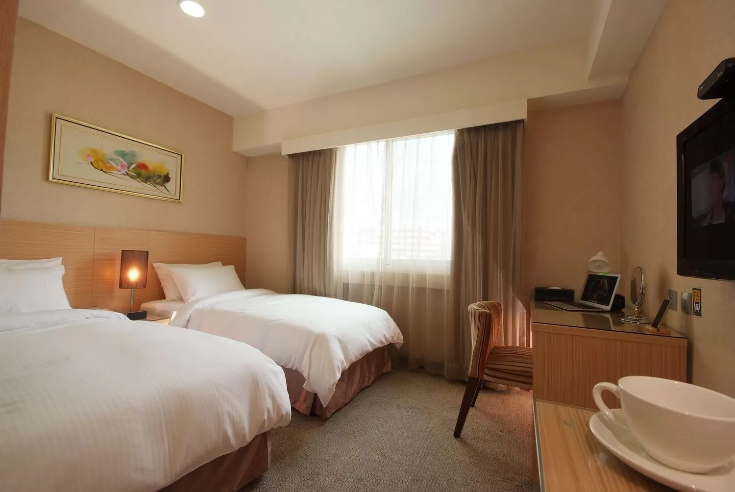 Bed in The Metro Hotel Taichung