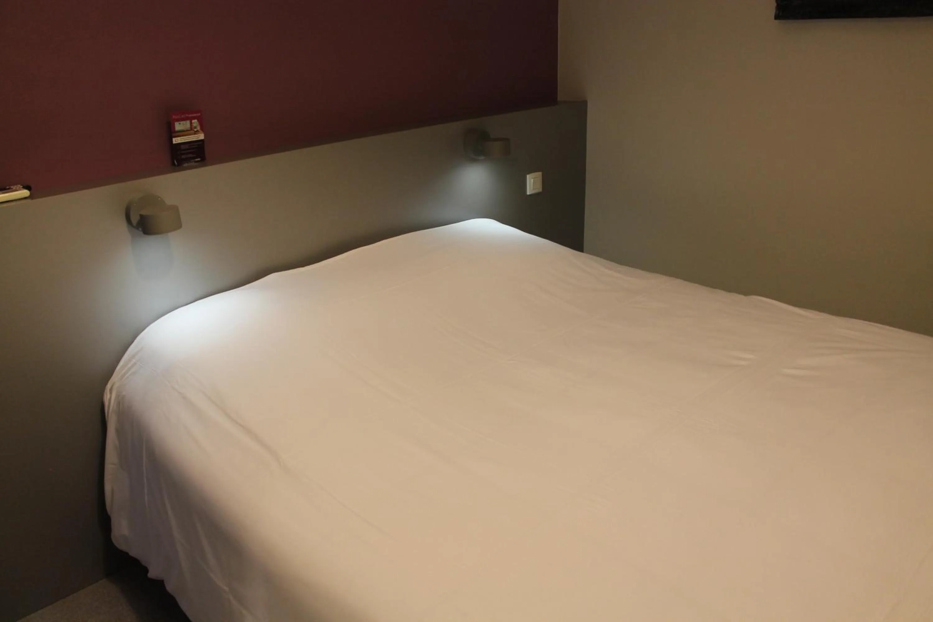 Photo of the whole room, Bed in Logis Hotels- Auberge de la Tour - Hôtel et restaurant