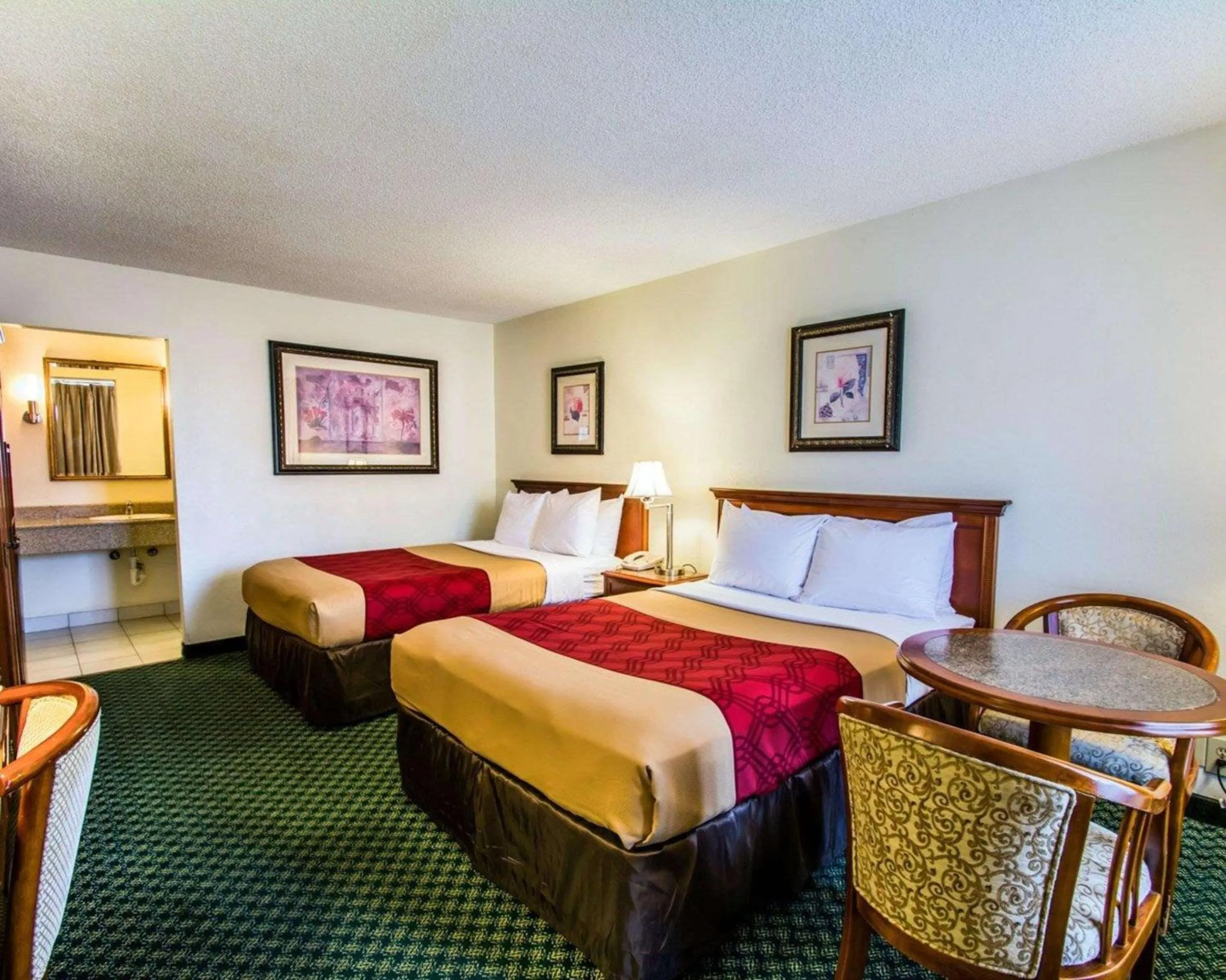 Photo of the whole room, Bed in Econo Lodge Port Canaveral Area