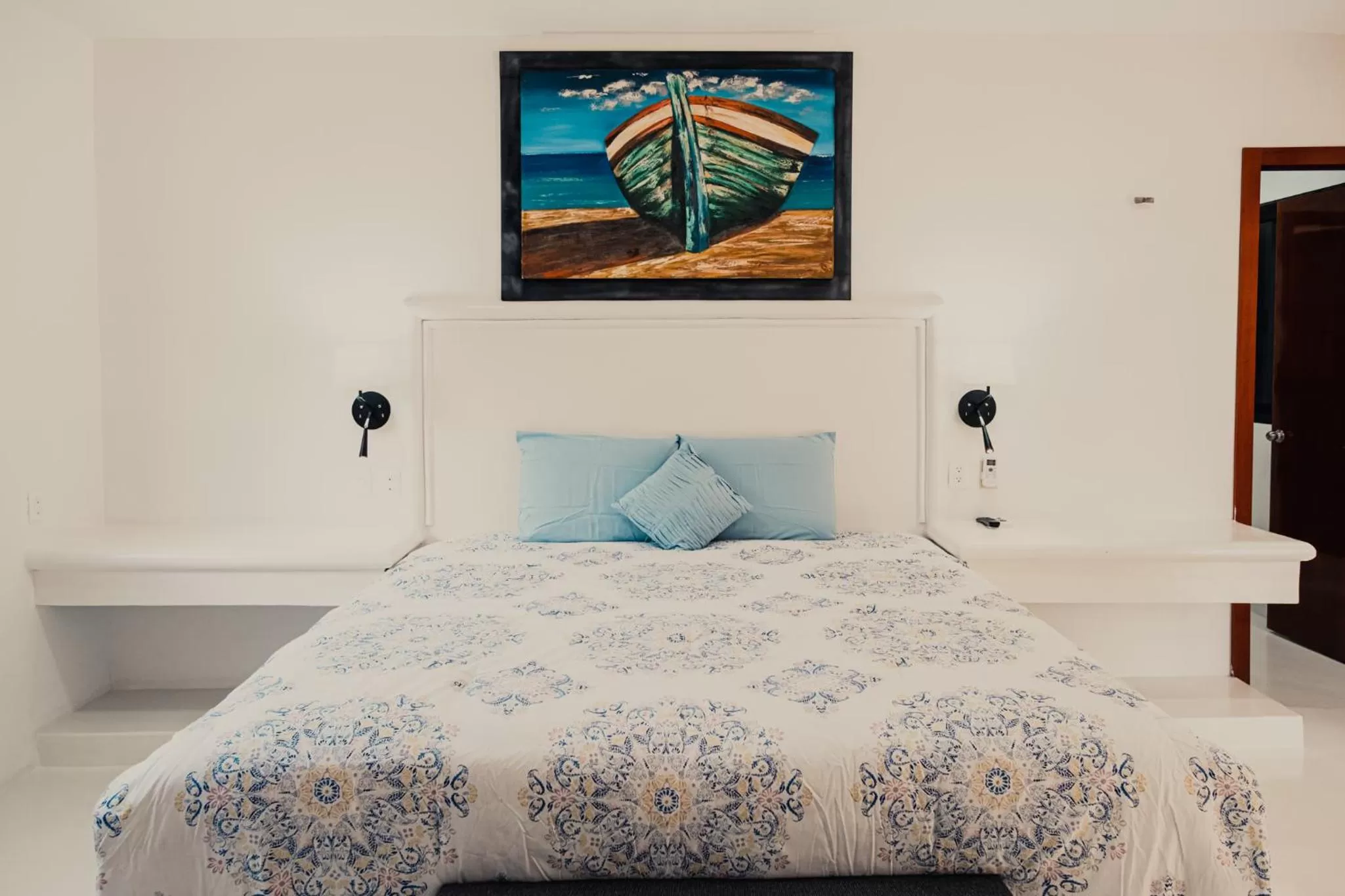 Bed in Royal Palm Bacalar Cabañas & Lagoon Club