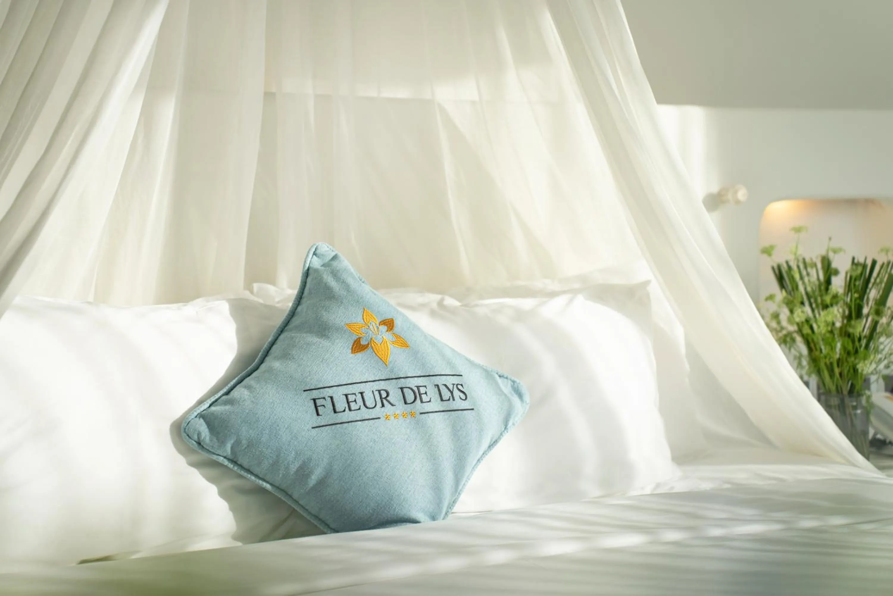 Bed in Fleur de Lys Resort & Spa Long Hai