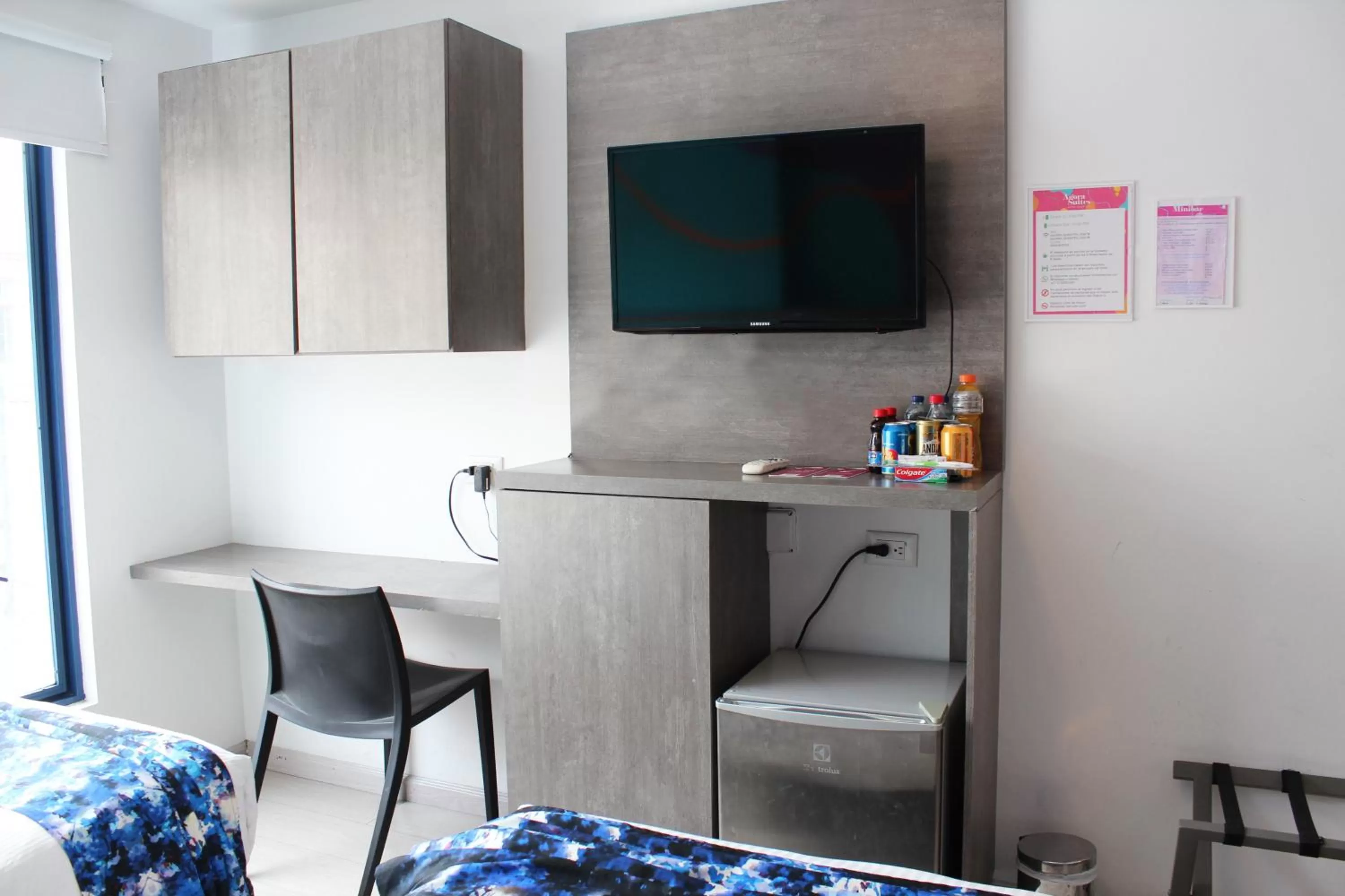 Bed, TV/Entertainment Center in Agora Suites Self-Service Boutique Hotel