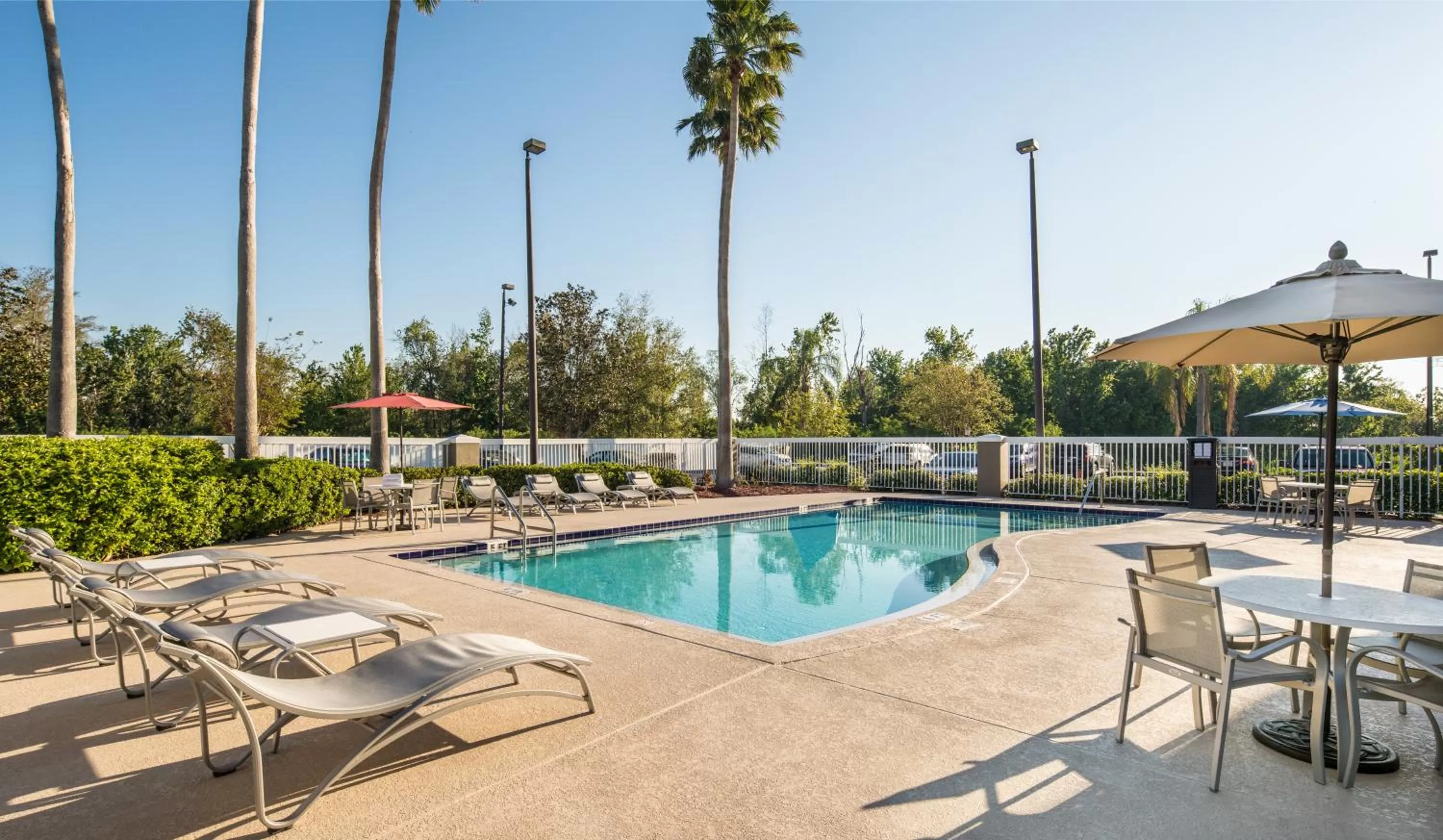 Swimming pool in Holiday Inn Express & Suites Orlando International Airport by IHG