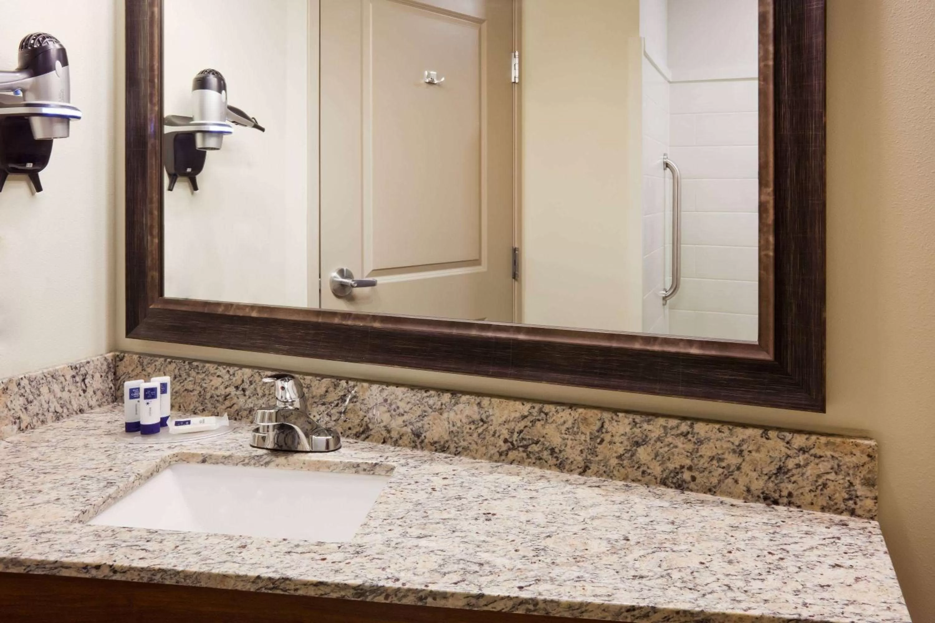 Bathroom in AmericInn by Wyndham DeWitt