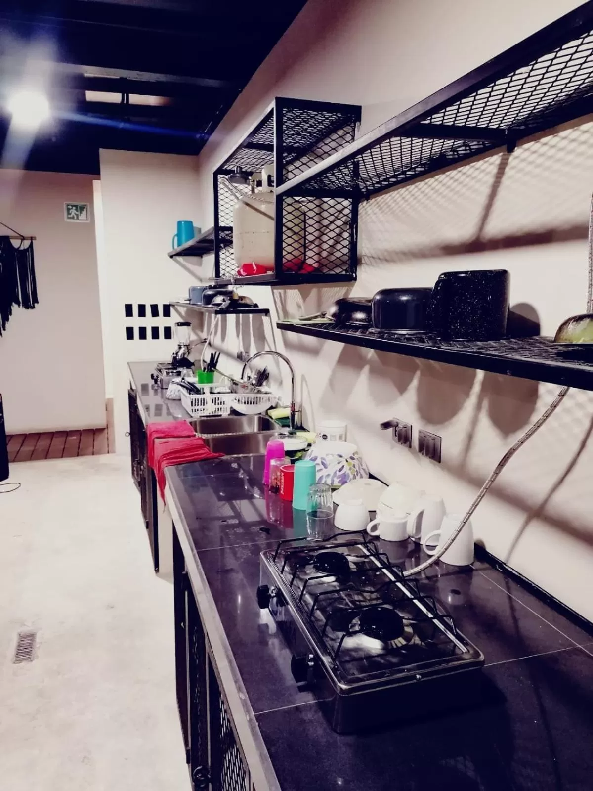 Communal kitchen in Moonshine Tulum Hotel & Hostel