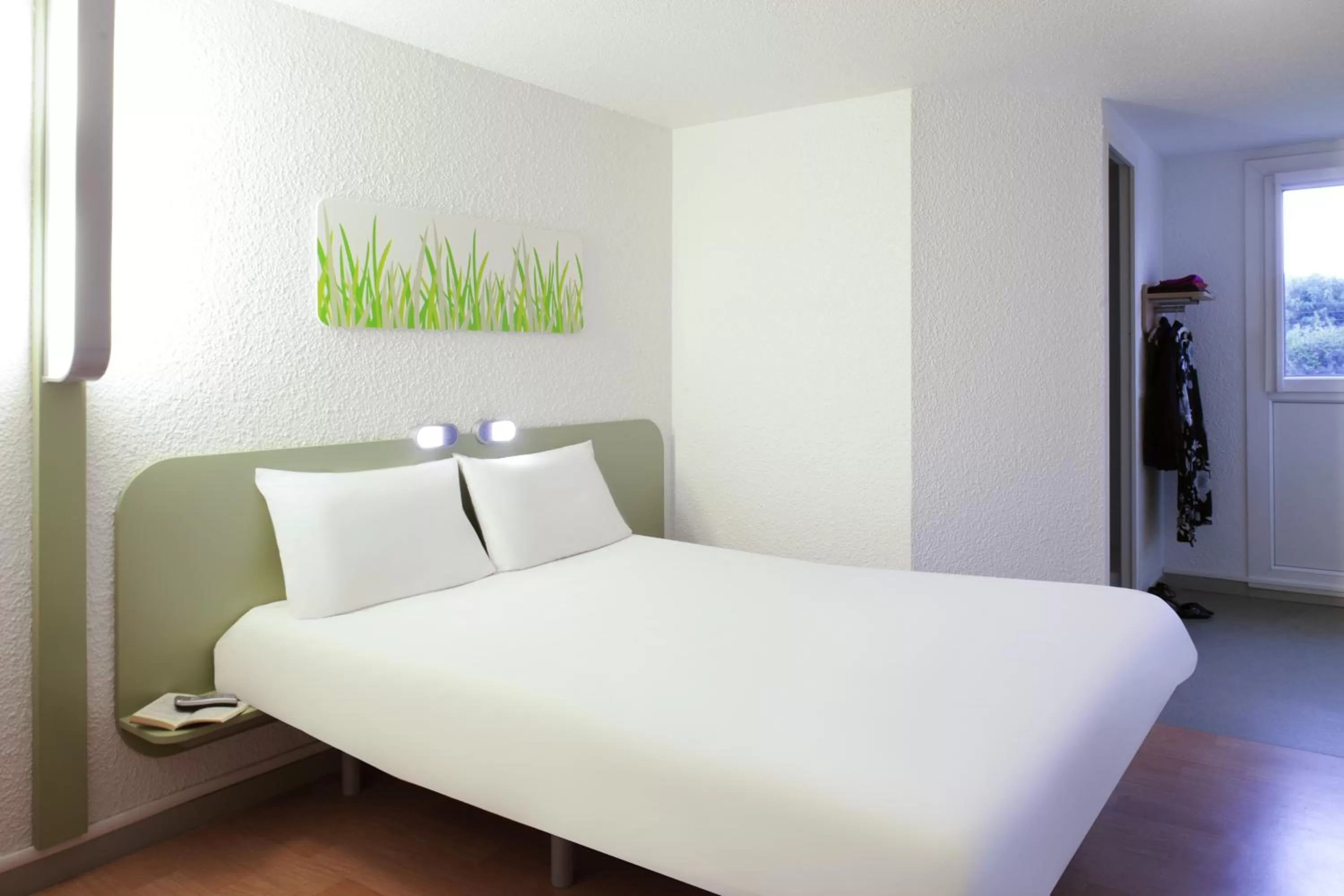Bed in IBIS Budget Tarbes