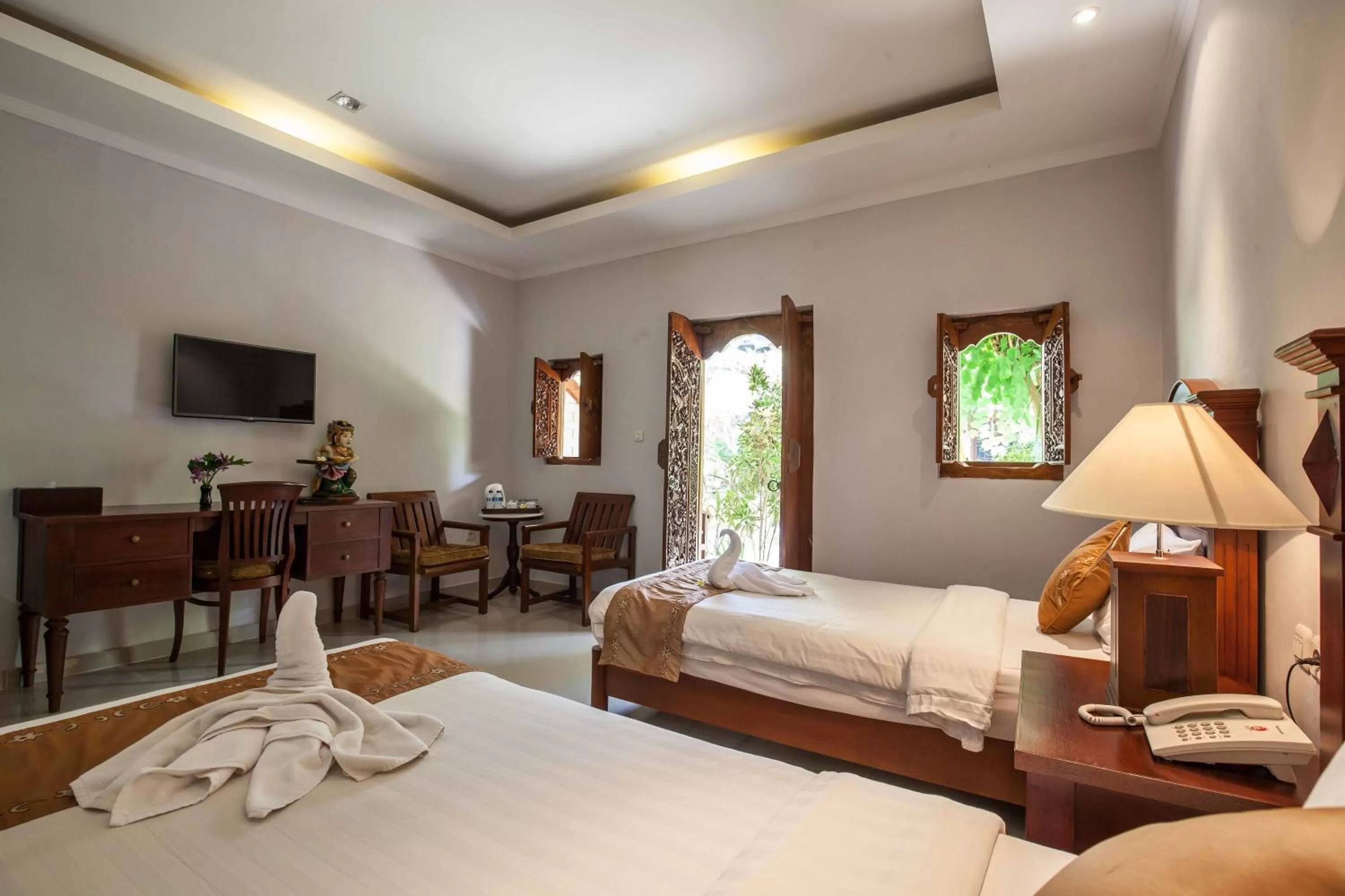 Bed in Vila Shanti Beach Front Hotel Sanur