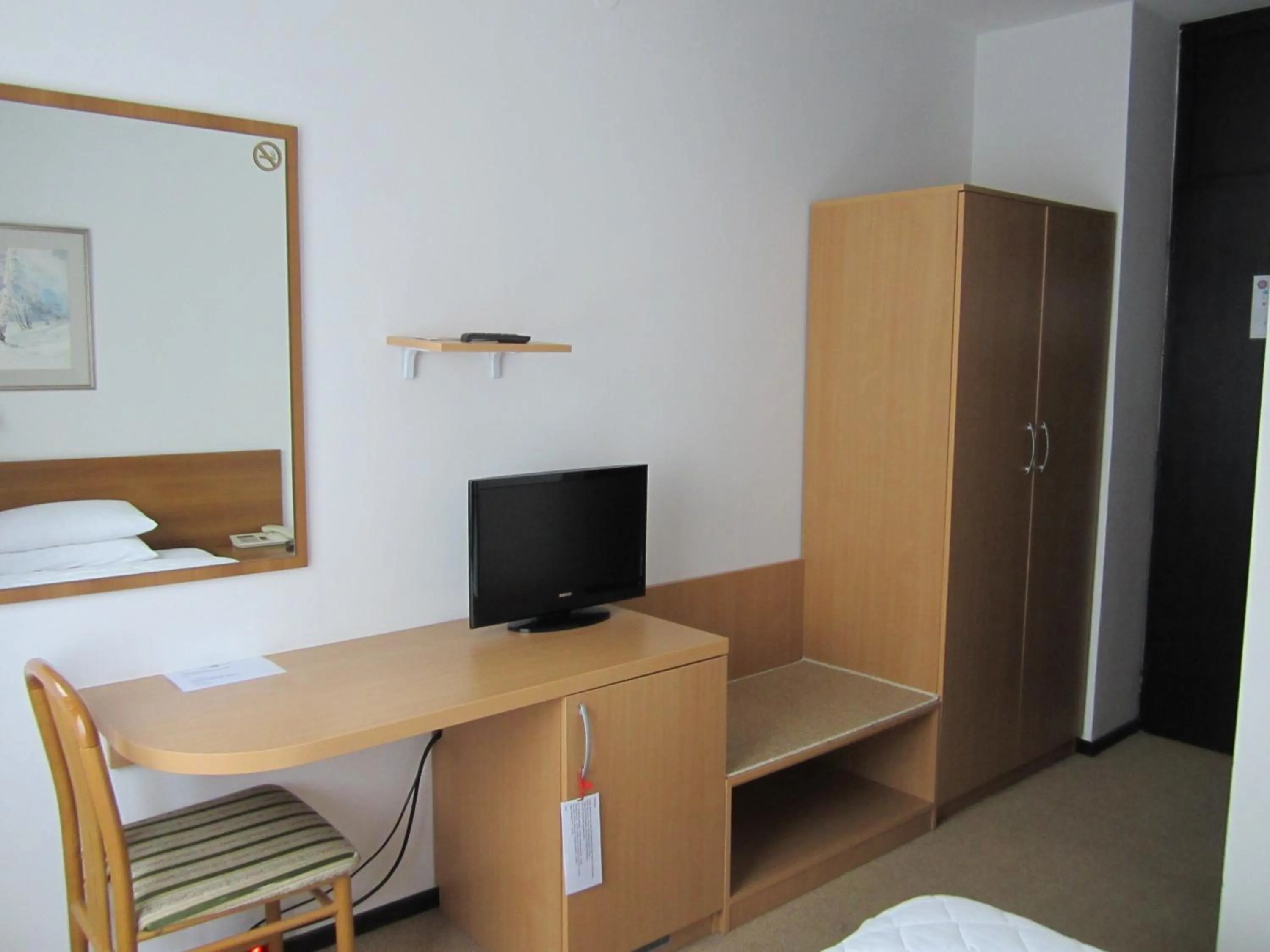 TV and multimedia, Bed in Hotel Grand