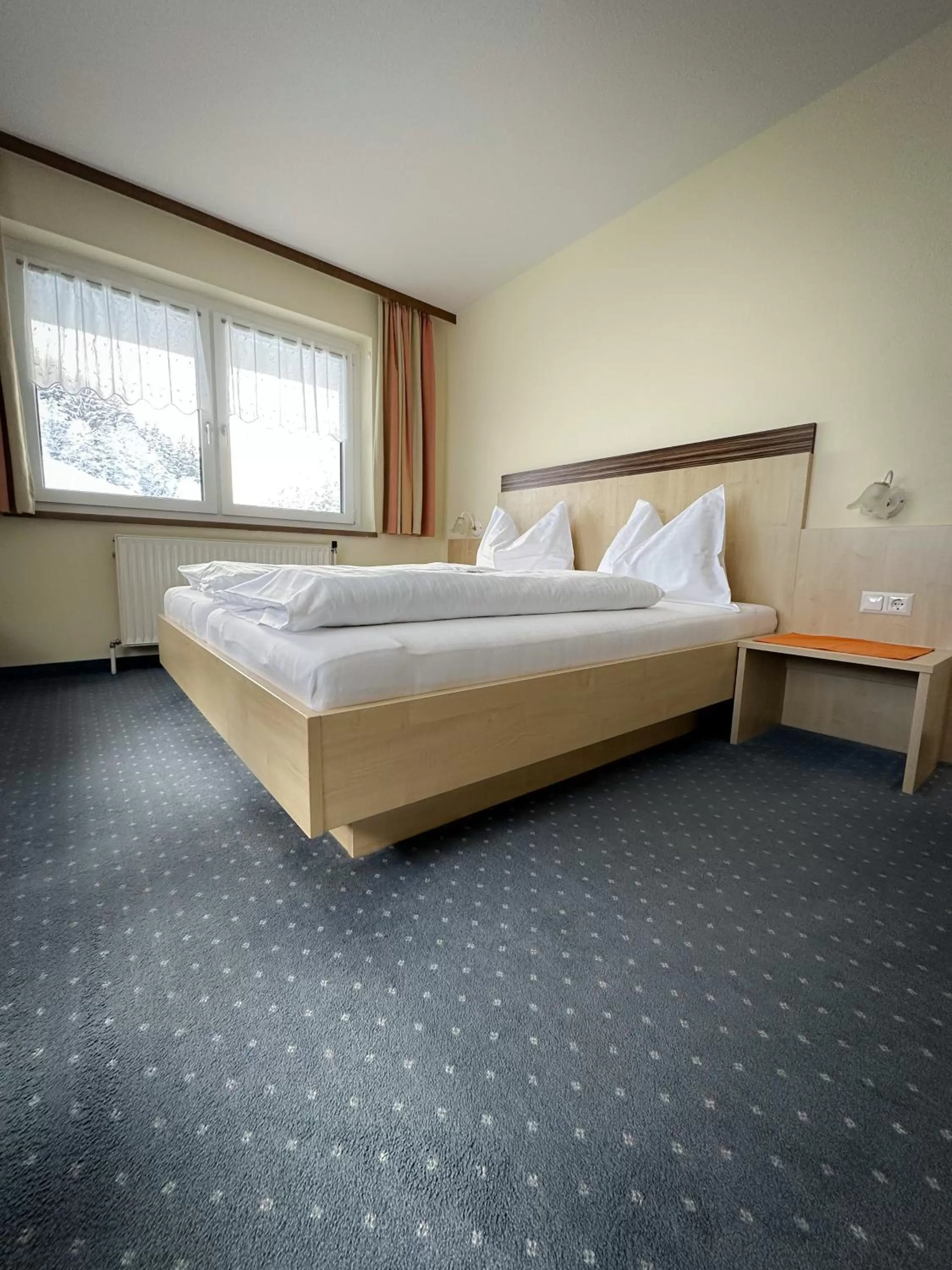 Bed in Frühstückspension Auer - Haus Kargl