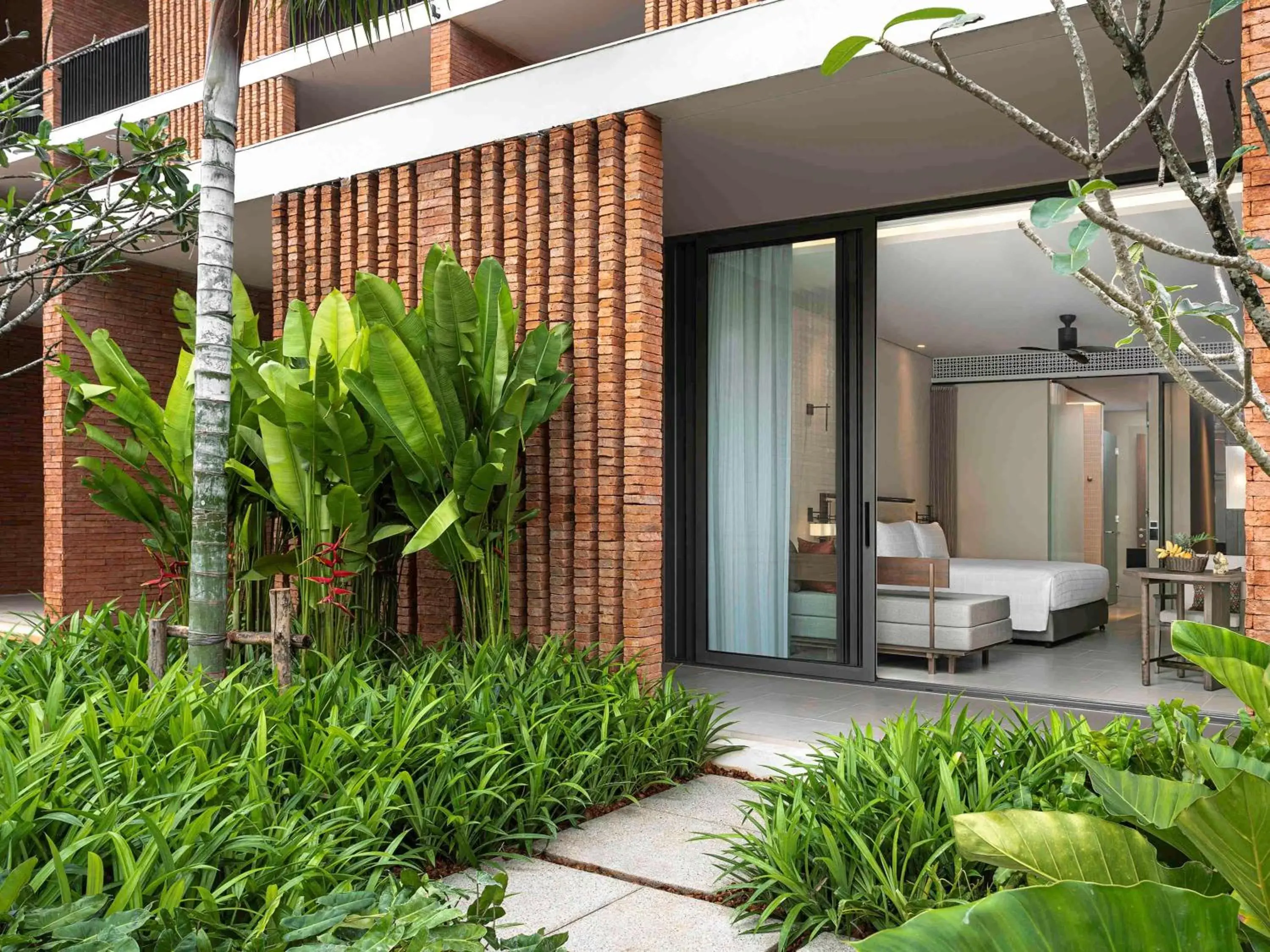 Deluxe King Room with Garden Access in Pullman Khao Lak Resort Deluxe King Room with Garden Access in Pullman Khao Lak Resort