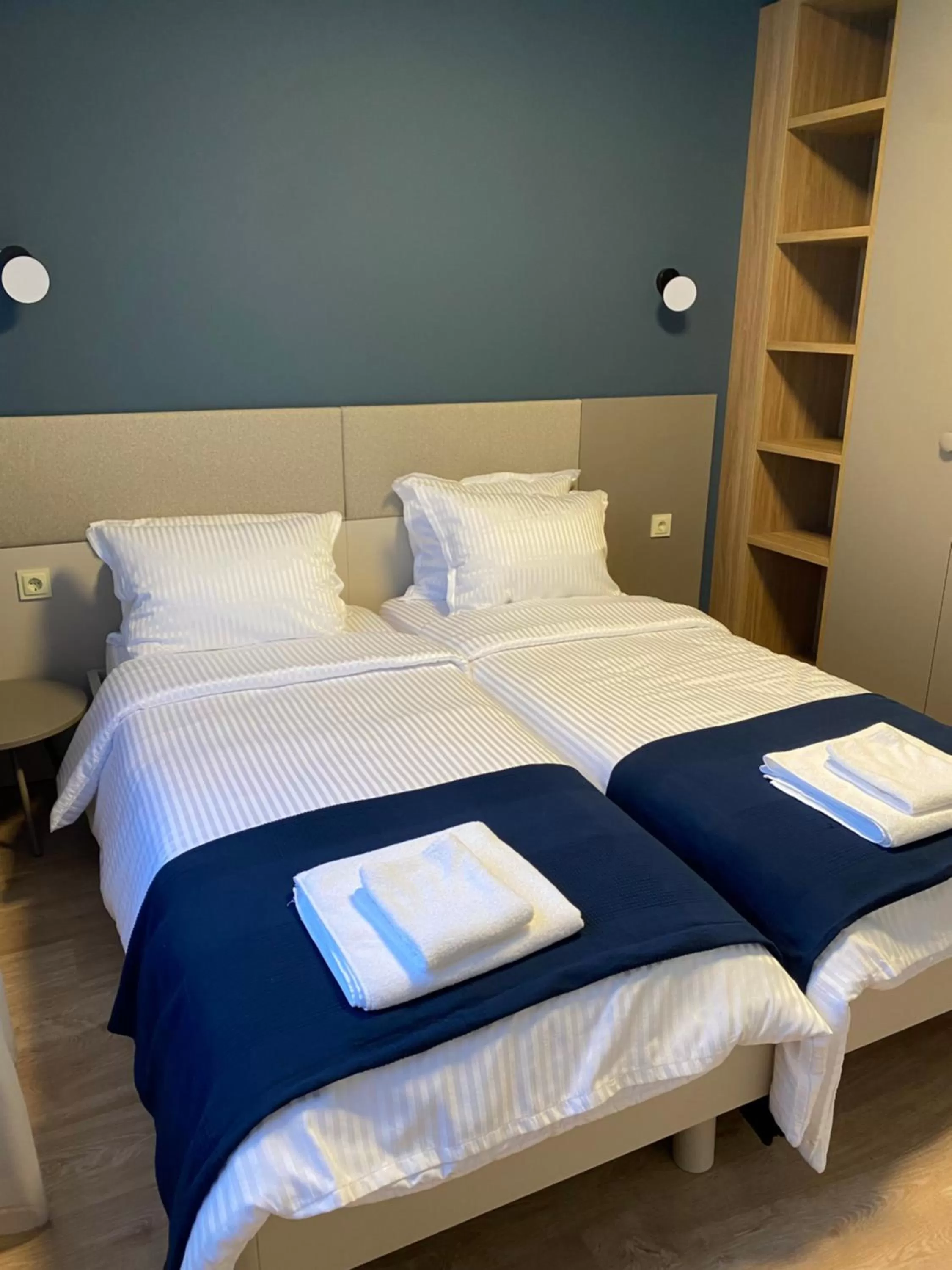 Bed in 7th Sense boutique apartments