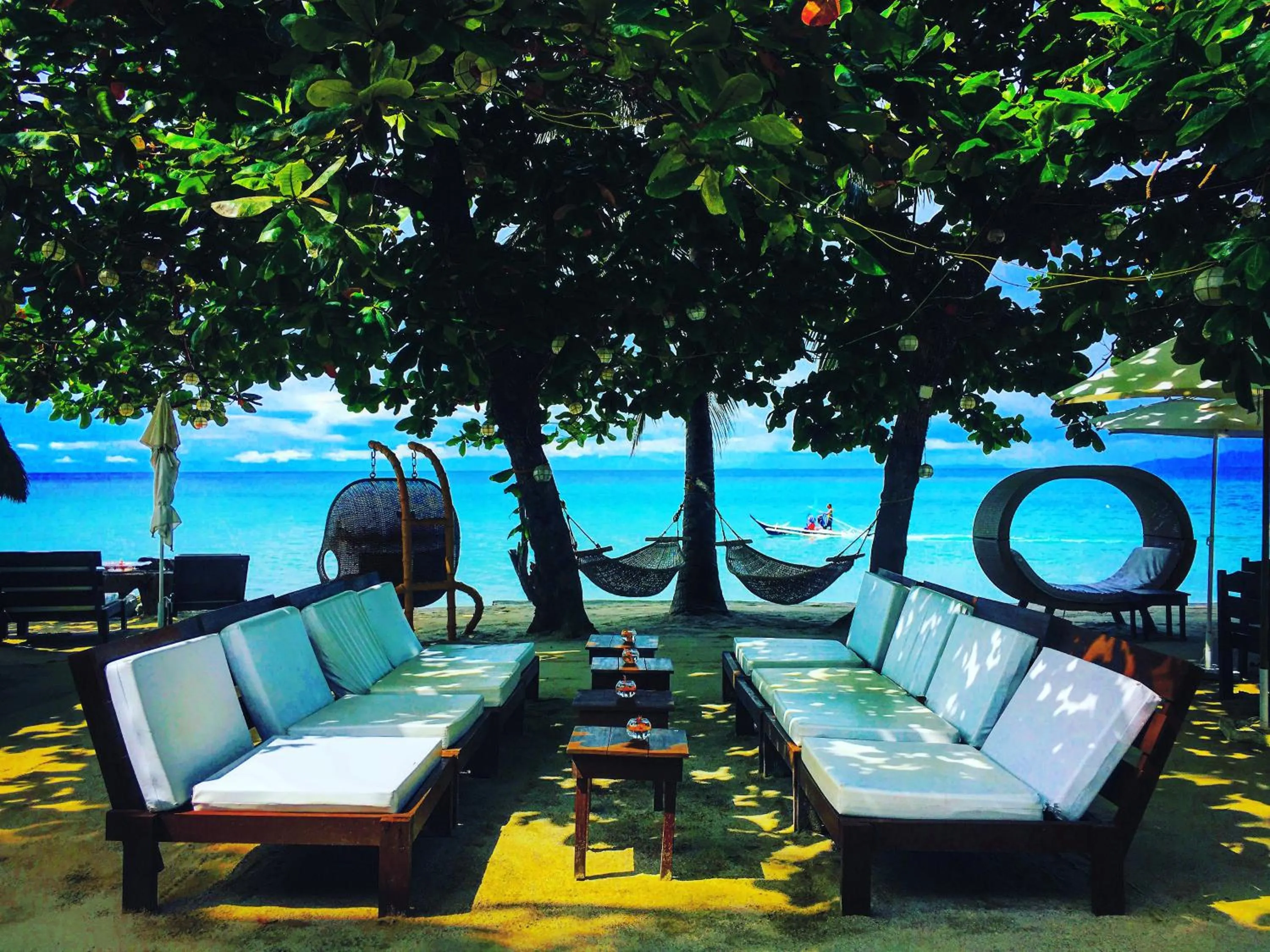 Seating area, Pool View in Sunset At Aninuan Beach Resort