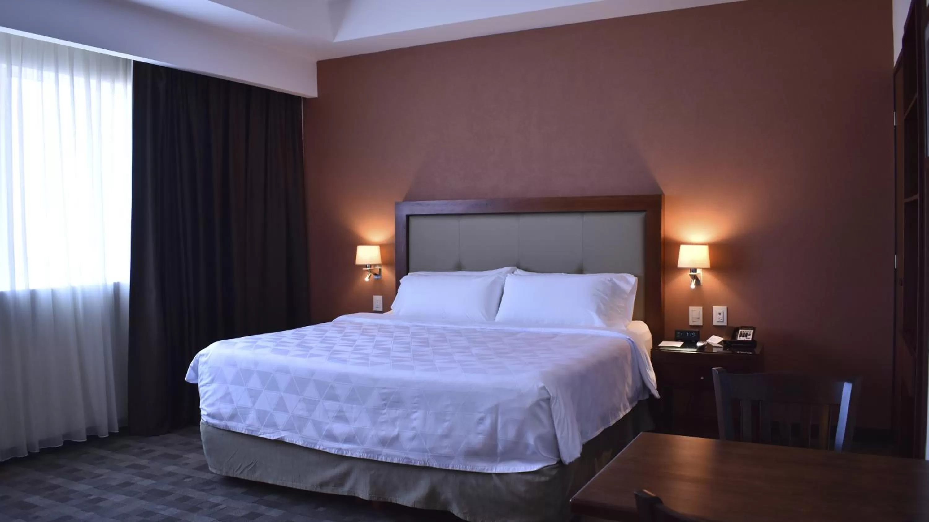 Bed in Holiday Inn & Suites Plaza Mayor by IHG