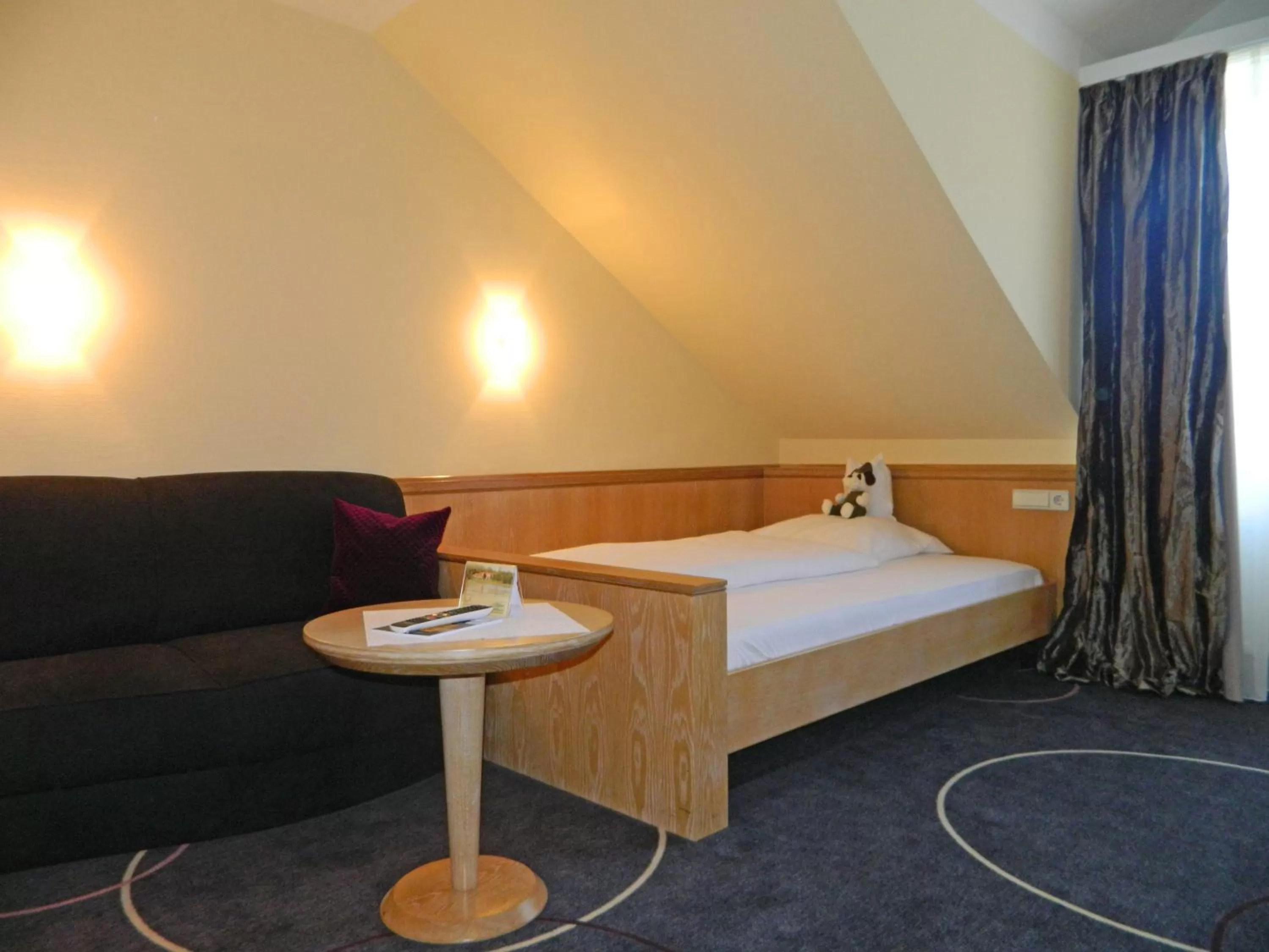 Bed in Köhlers Forsthaus Wellness & Genuss Hotel