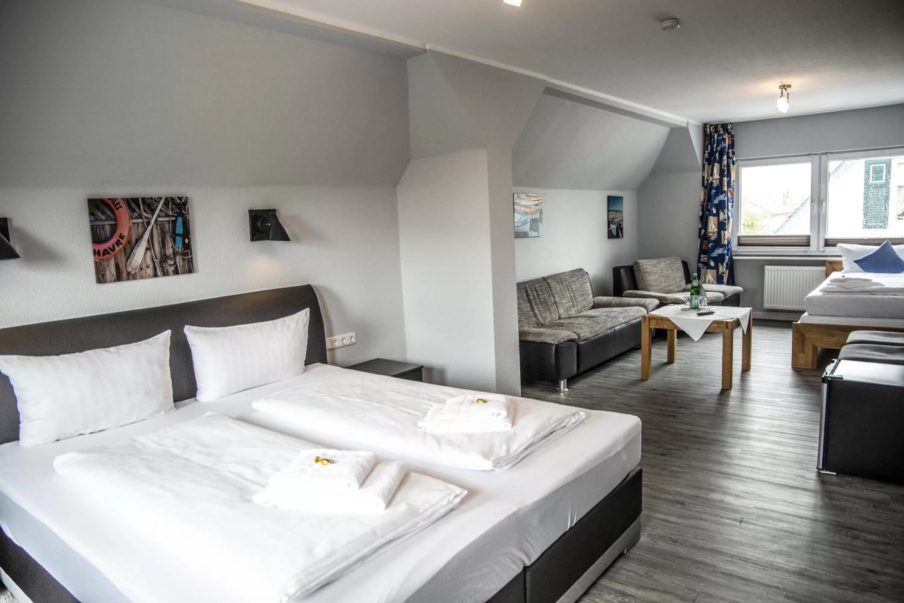 Photo of the whole room, Bed in Hotel Tum Stüürmann