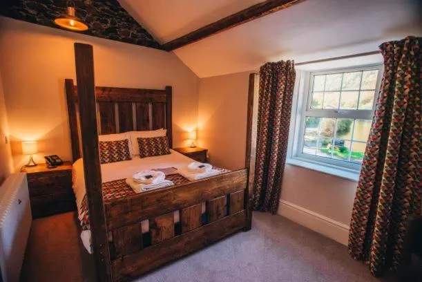 Bed in Tynycornel Hotel