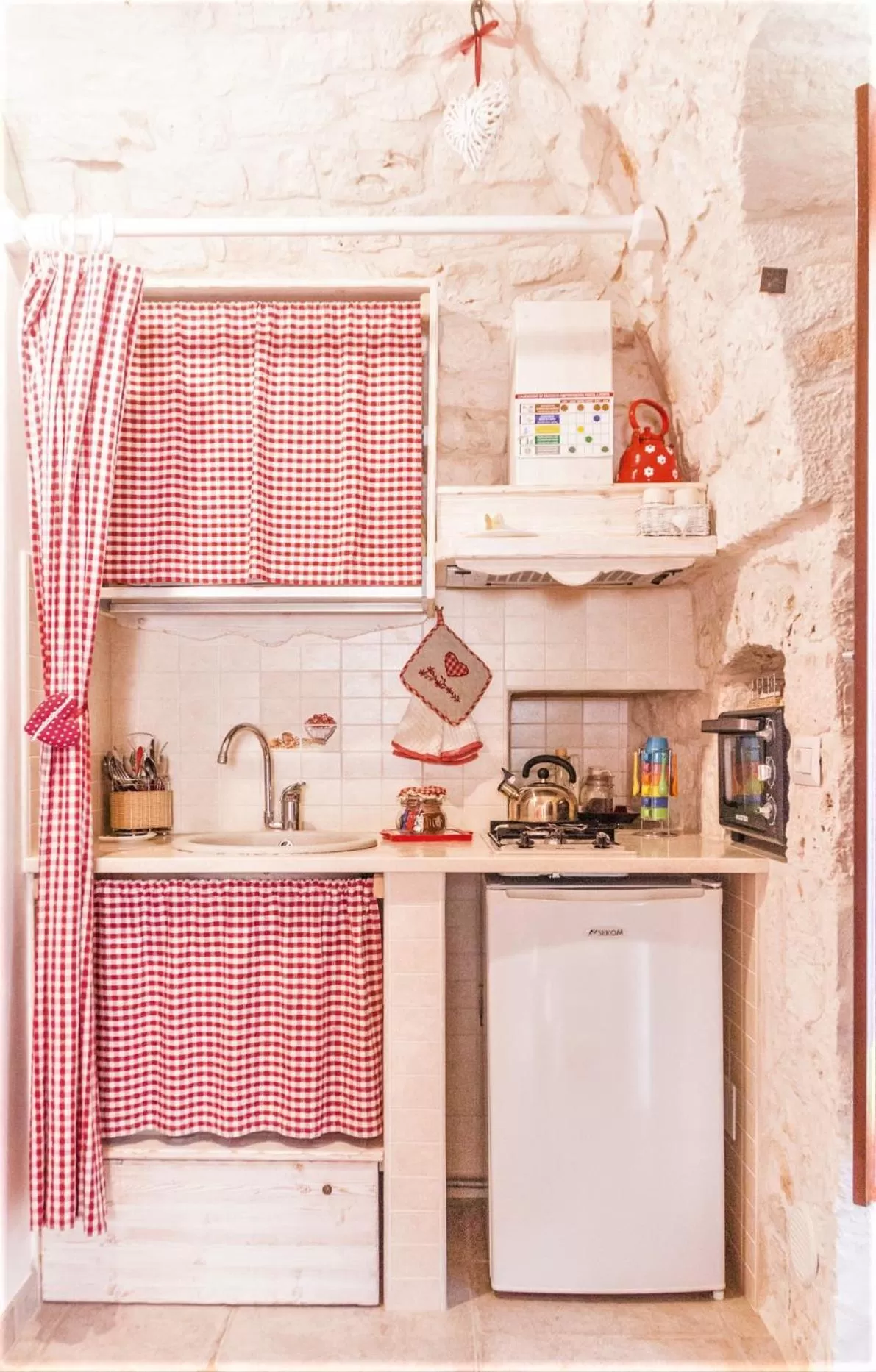 Kitchen or kitchenette in Trulli Donna Isabella
