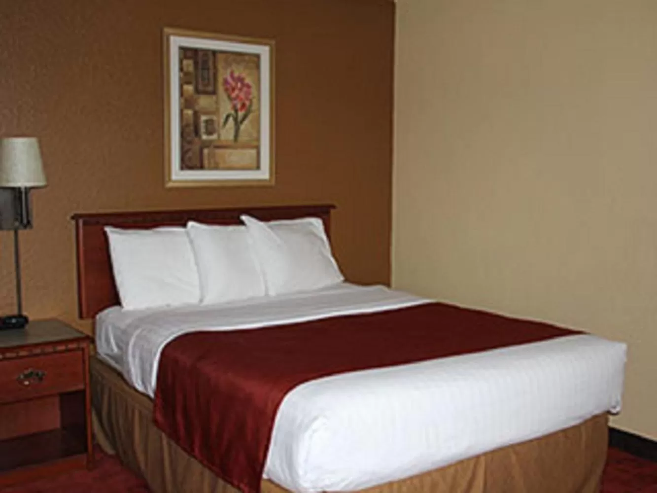 Photo of the whole room, Bed in AmericInn by Wyndham West Bend