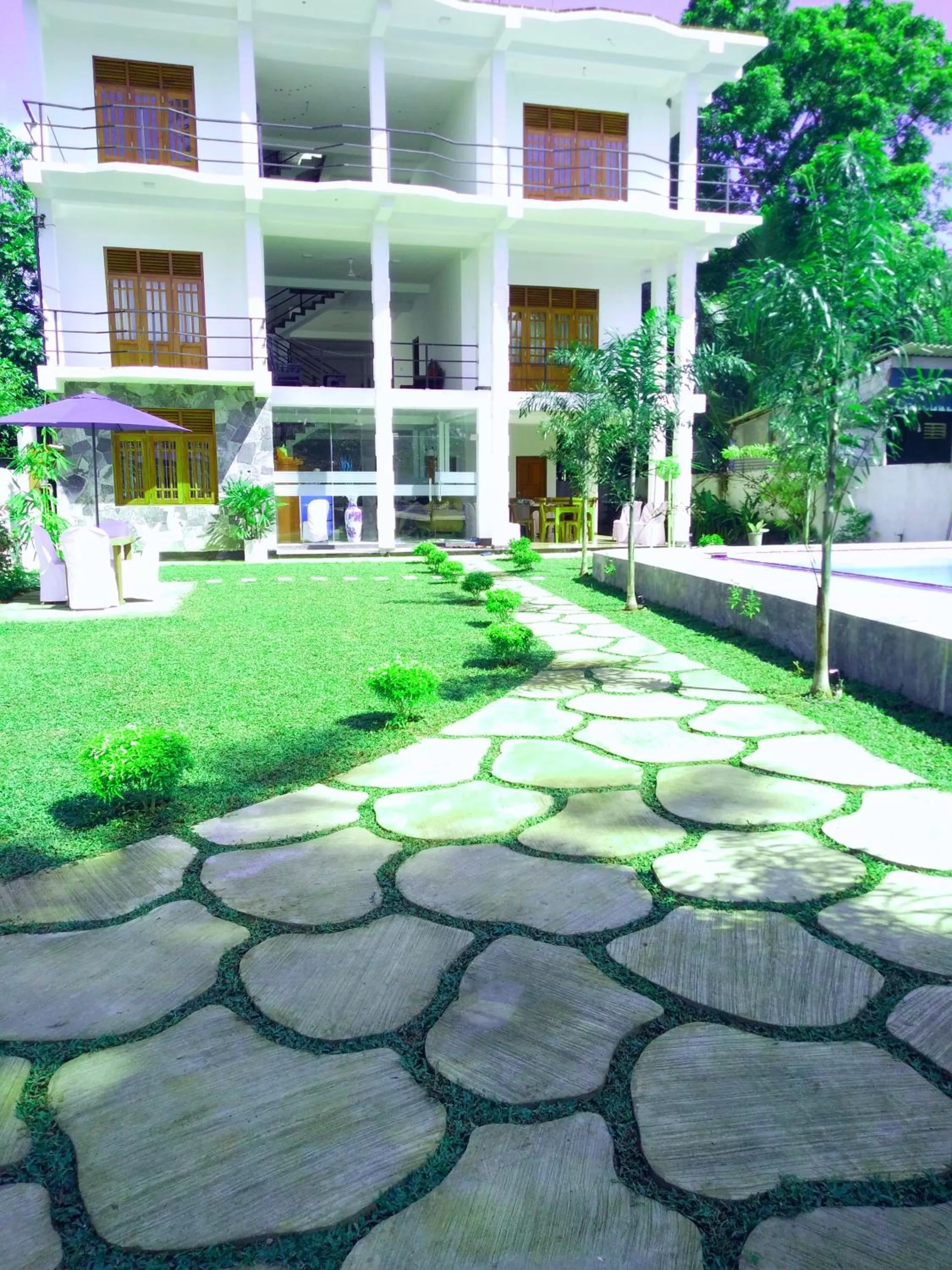 Property building, Swimming Pool in Ocean Bay Surf Resort Weligama