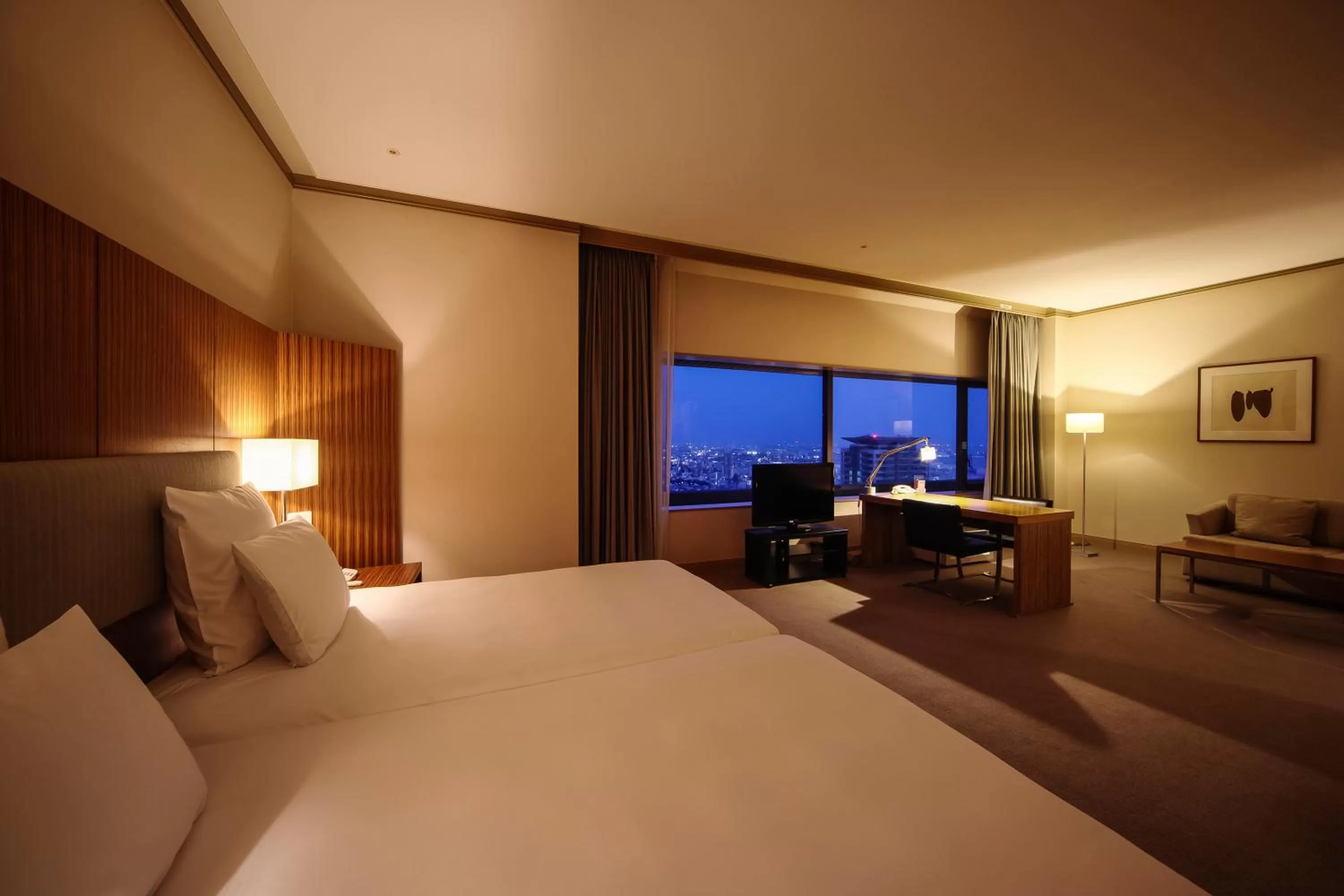 Bed in ANA Crowne Plaza Kobe by IHG
