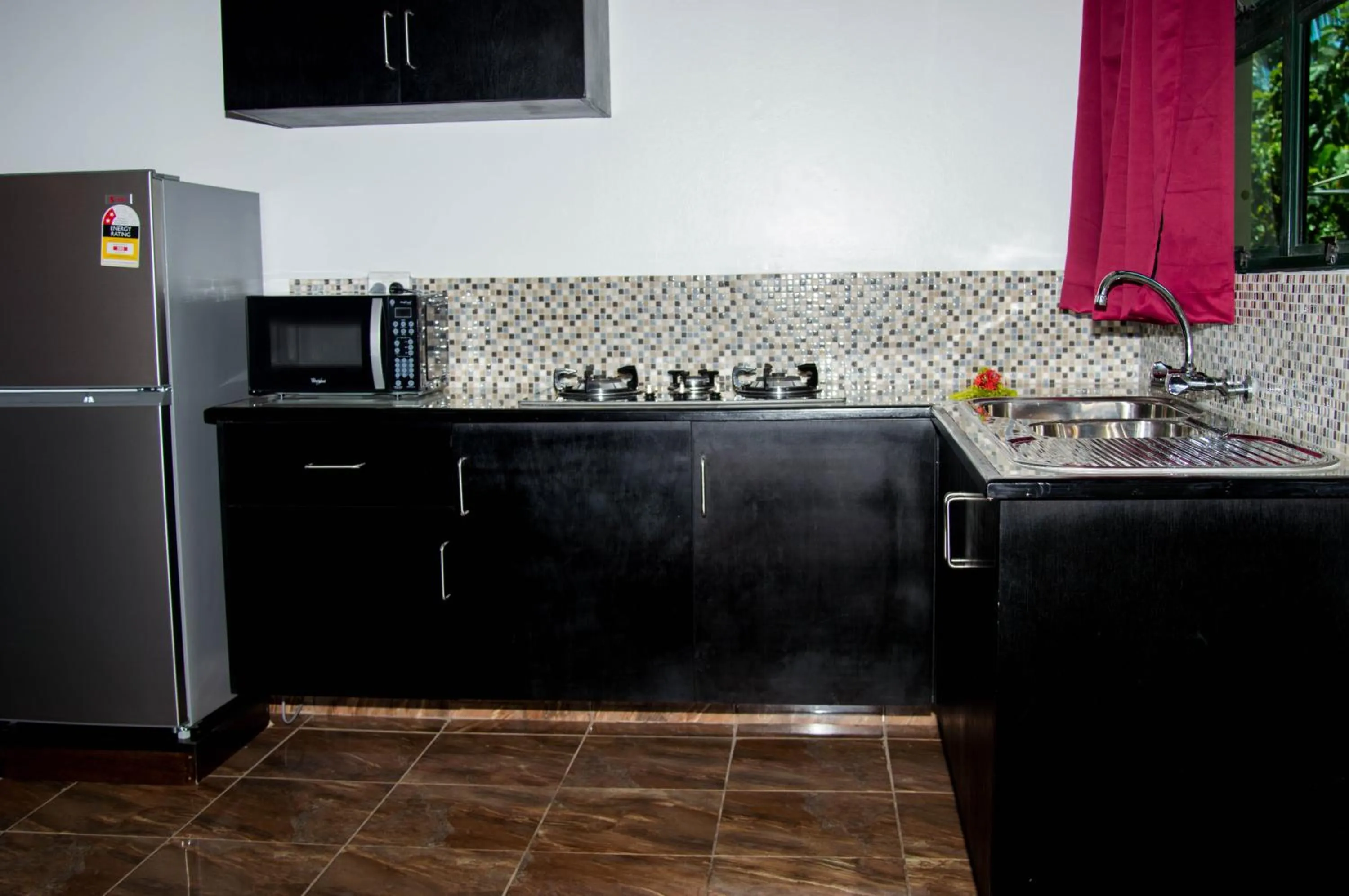Kitchen or kitchenette in Grand West Villas