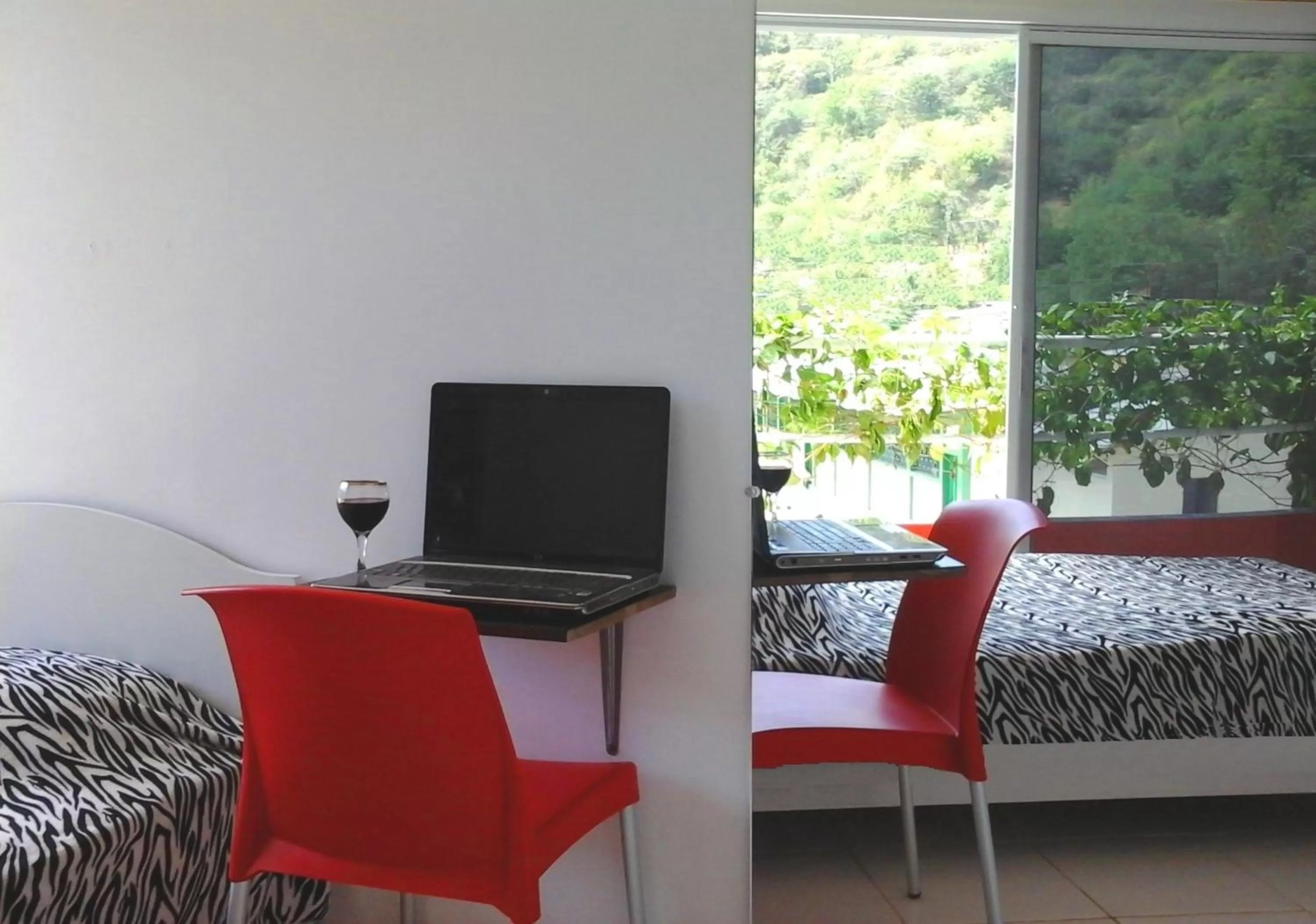 Bedroom, TV/Entertainment Center in Bahia B&B