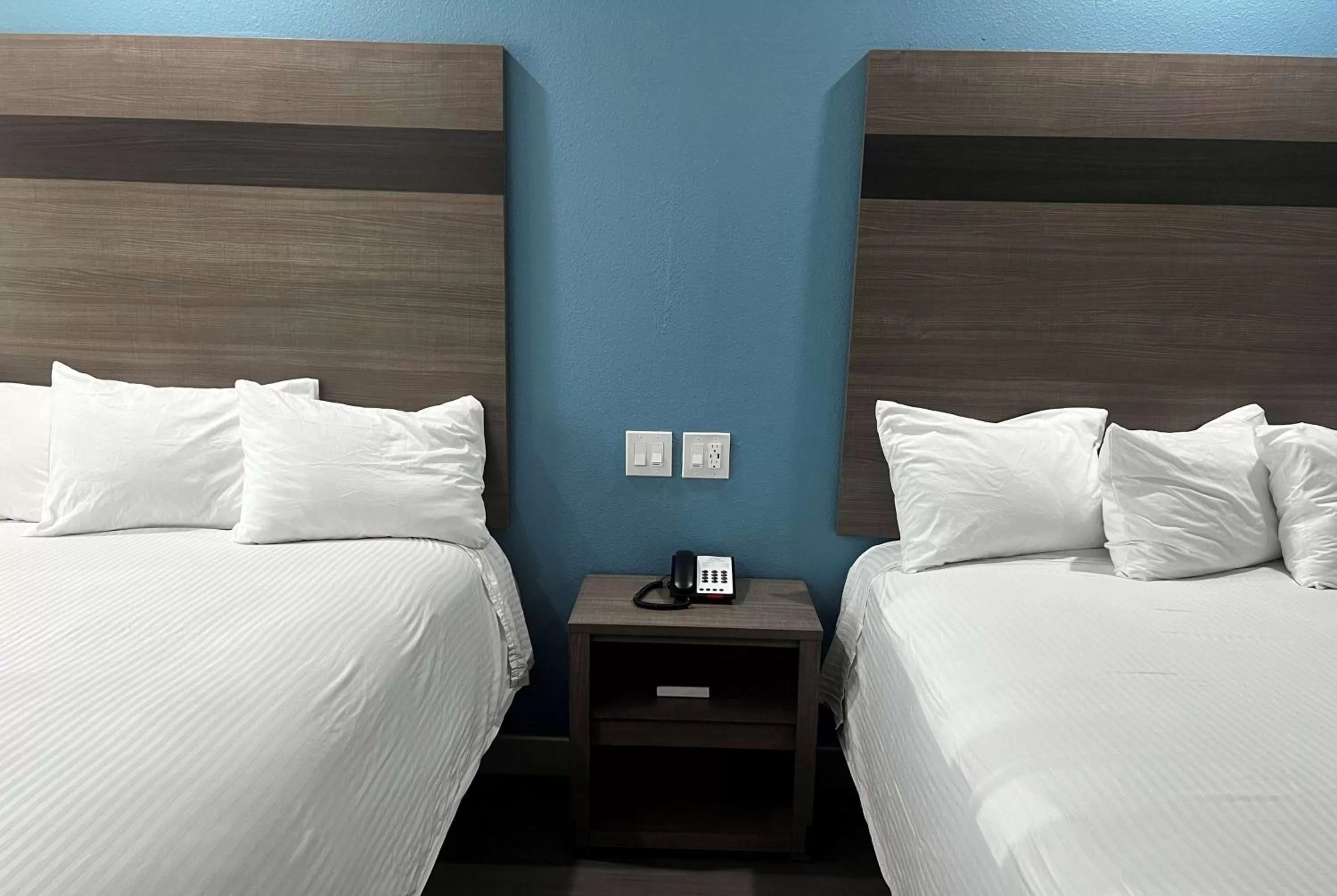 Photo of the whole room, Bed in Baymont by Wyndham Freeport Texas