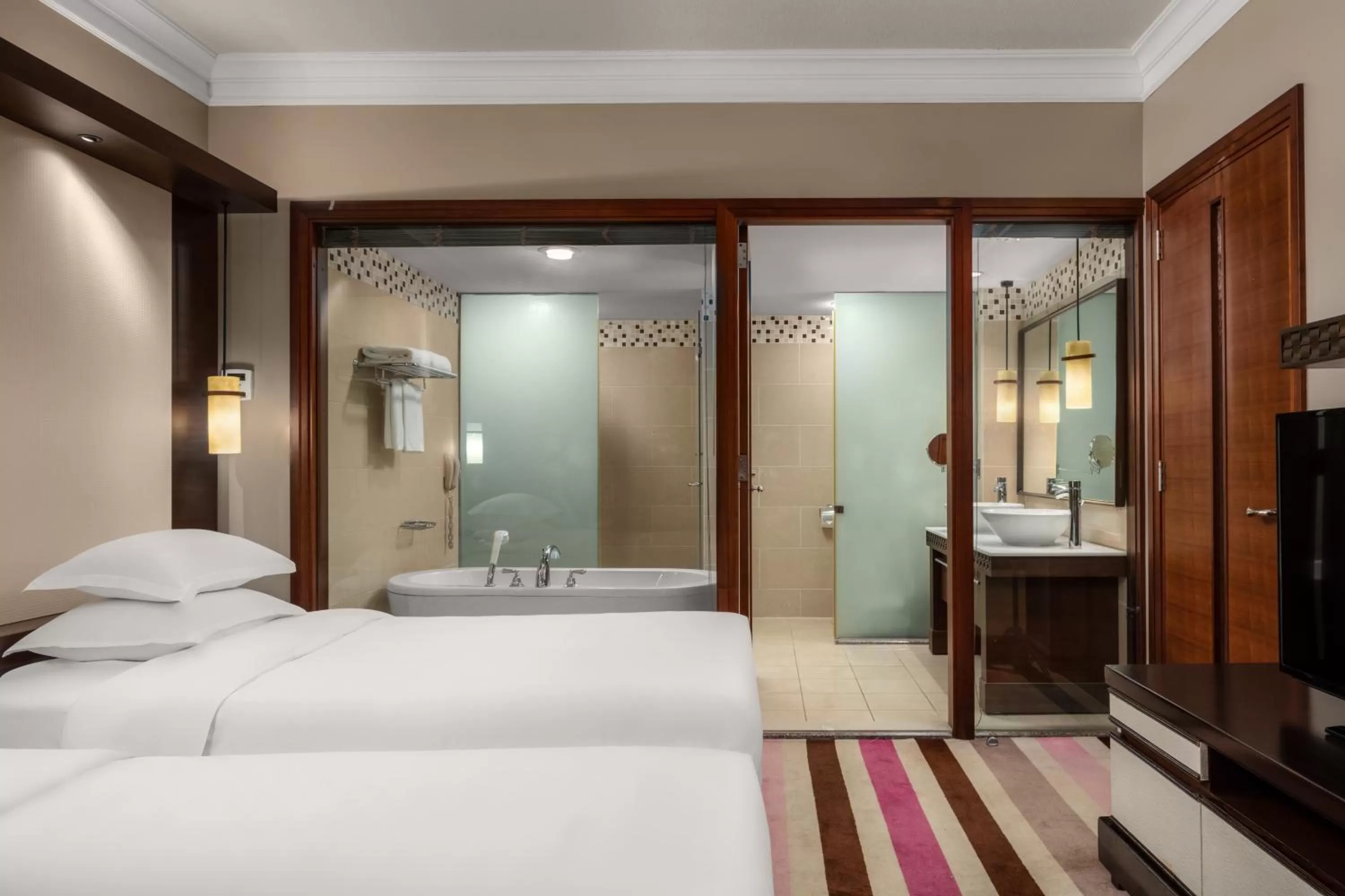 Bed in RIHGA Royal Laguna Guam Resort