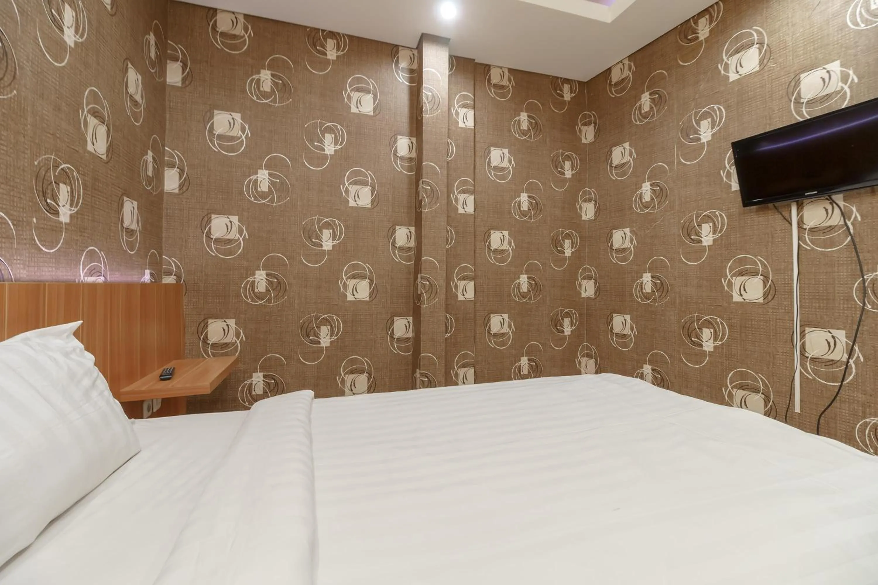 Bed in Green Apple Residence near Sarinah Mitra RedDoorz